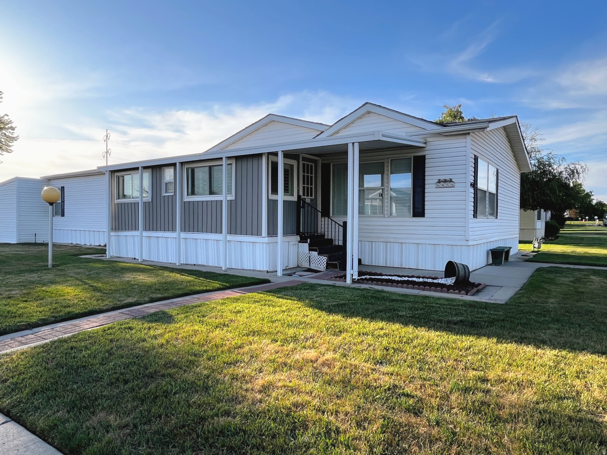 Beautifully maintained 1809sq/ft manufactured home in the highly sought-after Winchester Estates 55+ community! Ideally located directly across from the Murray Golf Course, this home offers peaceful surroundings with scenic views and easy access to outdoor recreation. Move-in ready and thoughtfully cared for, it provides comfortable living in a quiet, well-kept neighborhood. Enjoy the convenience of nearby shopping, dining, and freeway access while still feeling tucked away. Don't miss this opportunity to enjoy low-maintenance living in one of the area's most desirable communities!