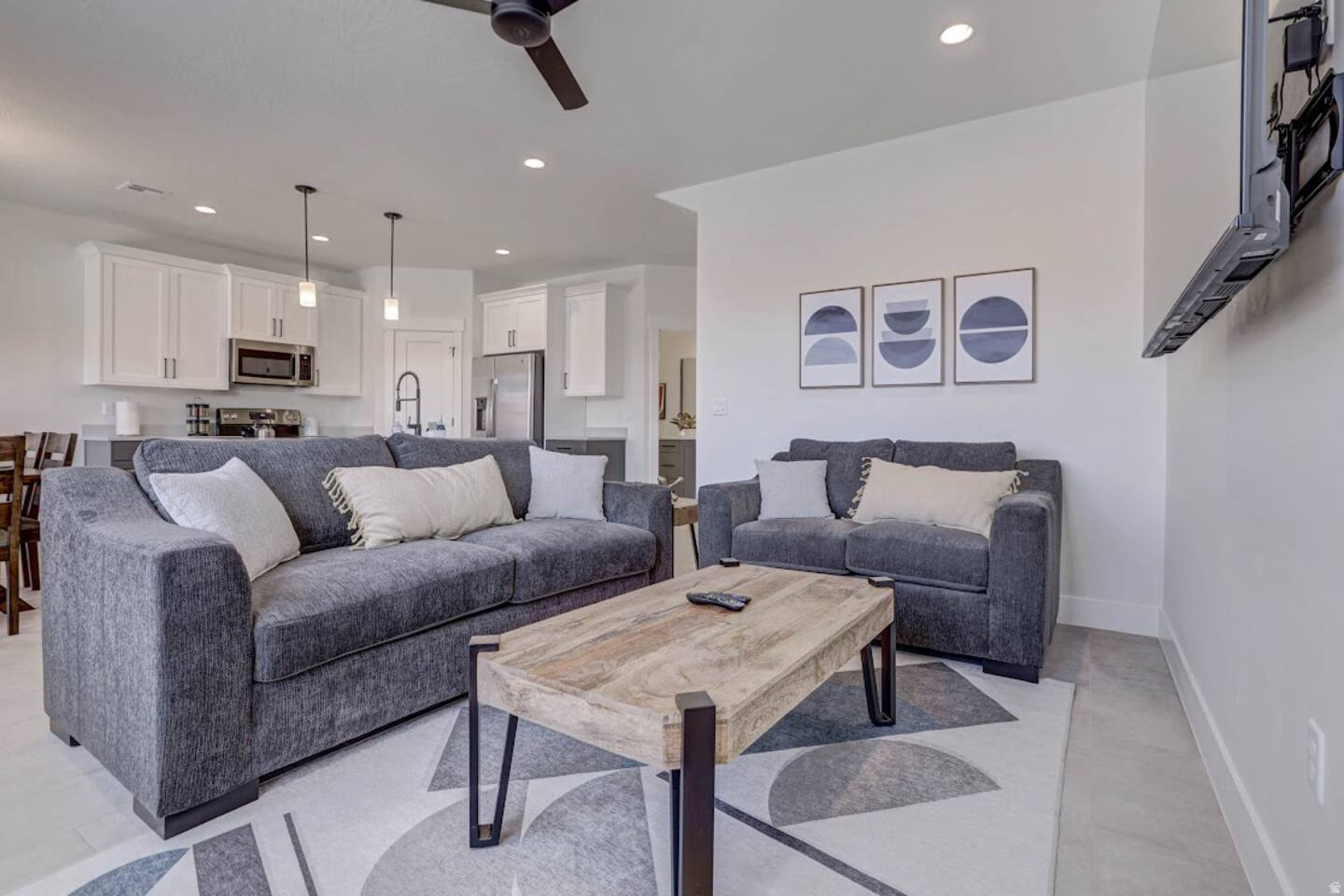 This meticulously maintained vacation rental that you can self-manage! Showcases exceptional quality and attention to detail throughout. Ideally situated on a hand-selected premium lot directly across from the community pool, with no backyard neighbors for added privacy. Features include tile flooring, quartz countertops, luxury vinyl plank flooring, upgraded cabinetry, designer lighting, a modern stair rail, and a spacious full master suite. Enjoy the private backyard complete with a hot tub and fire pit-perfect for relaxing after a day of adventure. Additional upgrades include an epoxy-coated garage floor, water softener, and thoughtful finishes throughout. This turnkey property is truly one of the finest units in the community.