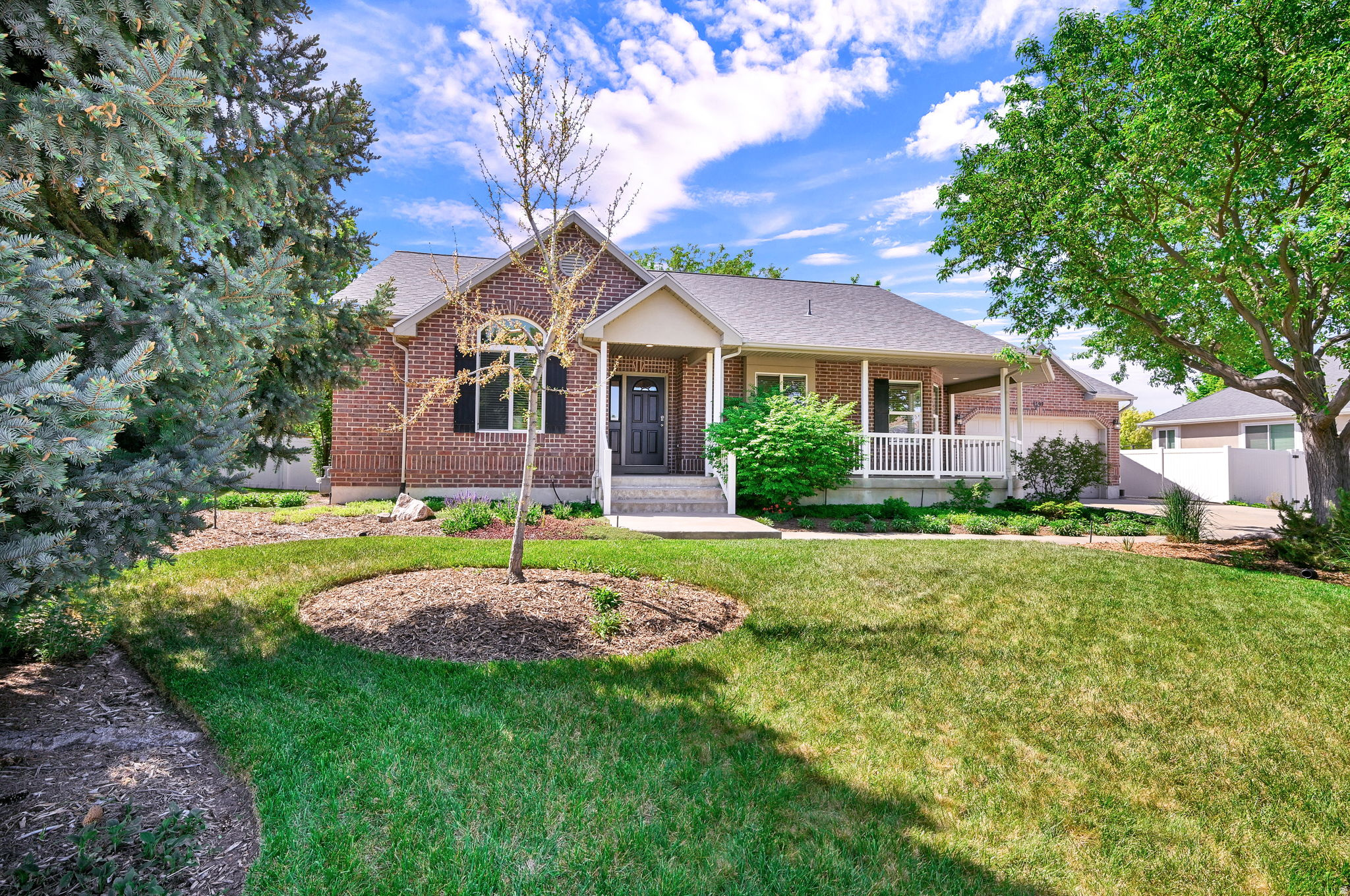 Finally - the home you've been waiting for. Unique and truly standing above the rest, this beautiful property features a fully landscaped, mature yard that creates a stunning setting from day one. No need to wait years for trees to grow - enjoy the beauty, shade and privacy of a well-established yard now. The open-concept family room with real hickory wood flooring, highlighted by a cozy fireplace that flows seamlessly from the kitchen, creates the perfect space for gathering and connection. Downstairs, the spacious basement offers a large open entertainment area, along with two generously sized bedrooms and a shared bathroom. With its distinctive character and inviting feel, this is a home you'll love coming back to - ready for you to make it your own.