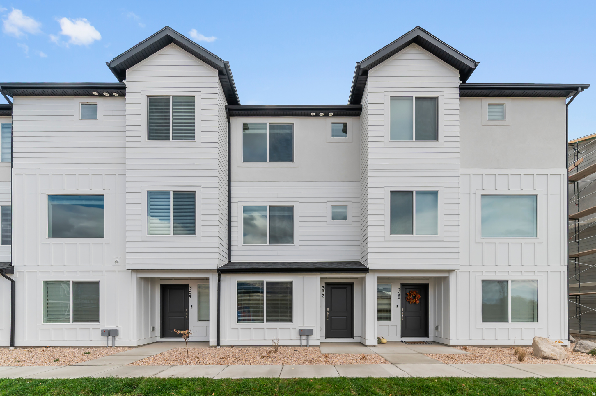 Completing in September; Welcome to the Emery at Dixon Creek in Harrisville-a stylish 3-story townhome designed for modern living. This home features 3 bedrooms, 3 bathrooms, and a 1-car garage, with flexible space on the entry level complete with a full bath-perfect for a home office or guest room. The open-concept main floor offers a seamless flow between the kitchen, dining, and family room, ideal for everyday living and entertaining. Upstairs, both bedrooms include en suite bathrooms and walk-in closets for added comfort and privacy, along with a convenient laundry area. Enjoy energy-efficient construction, smart home features, and low-maintenance living in a thoughtfully designed community. ***ASK ME ABOUT THE BELOW MARKET INCENTIVE RATES with our preferred lender + $$$ towards Closing costs! *** No representation or warranties are made regarding school districts or assignments. Photos may be of a similar home. Buyers to verify all colors, materials, options, and square footage, which is provided as an estimate from building plans. Sales Center Hours: Mon, Tue, Thu, Fri, Sat: 11 AM  6 PM Wed: 1 PM  6 PM | Closed Sun Call to schedule your visit!