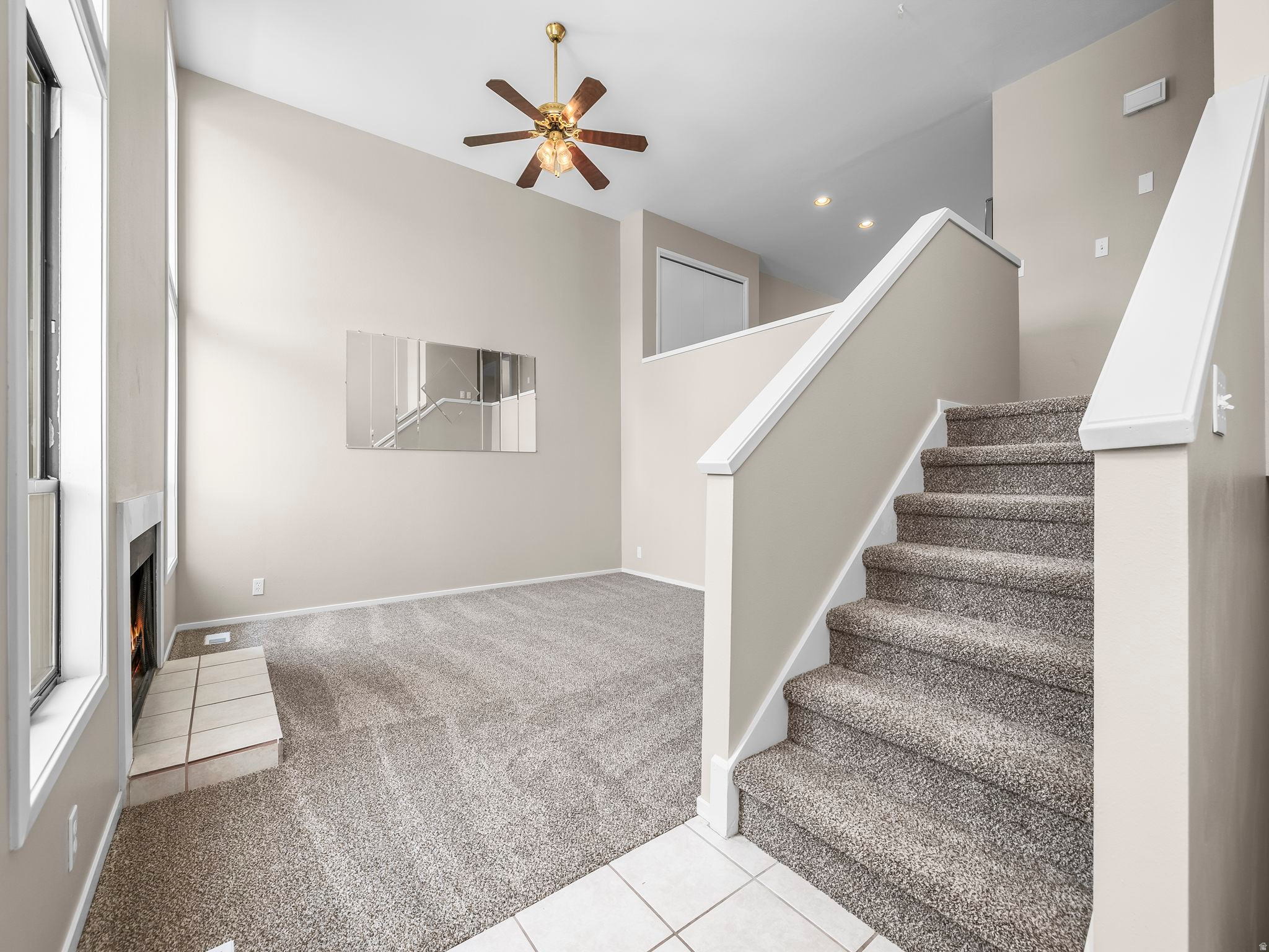 Tucked away on a quiet, private street in Taylorsville, your new fully remodeled home is truly move-in ready - you'll love the fresh two-tone paint and the comfort of your new plush carpet underfoot. Step through the front door into a bright, open family room with a soaring two-story ceiling, a cozy fireplace, and oversized windows that flood the space with natural light - an inviting spot to unwind at the end of the day. A few steps up, your fully renovated kitchen brings everyone together with new granite countertops, stainless steel appliances including your refrigerator, and a layout that opens naturally into the dining area, finished with new luxury vinyl plank flooring and sliding glass doors that lead out to your deck, shaded by a mature pine tree and perfect for peaceful mornings or relaxing evenings with friends and loved ones. You'll also find two bedrooms on this level, along with a full bathroom finished with matching new granite countertops - flexible space for guests, a home office, or whatever fits your life. Downstairs, your private basement level adds two more bedrooms, a full bathroom with the same granite finish, and a spacious laundry room complete with your washer and dryer, cabinets, shelving, and a large basin sink. With its own separate entrance and plumbing already roughed in for a kitchen, you'll have effortless potential to add a mother-in-law apartment or income space down the road, while a nearby crawl space keeps storage and utility access simple. Step out from the basement onto your covered patio - the perfect place to relax after a long day, with real potential for a future spa. Your yard beyond is just as inviting: private and secluded, staying cool and shaded beneath one large, lush pine tree that towers overhead, ideal for peaceful mornings, quiet afternoons with a book, or gathering with friends and loved ones as the sun goes down. Your storage shed keeps hobbies and extra gear organized, and your detached two-car garage at the back of the property offers automatic access with remotes for everyday convenience. With a new furnace (2022), a newer AC system, and new appliances throughout, you can move into your new home with the comfort of knowing the big-ticket items are already taken care of - less to worry about, more time to simply enjoy where you live. Tucked away in a quiet, private neighborhood, yet just minutes away from Salt Lake Community College, convenient shopping, and excellent dining options, with major employment centers nearby and the Salt Lake City International Airport only about fifteen minutes down the road. You'll also enjoy the neighborhood's community clubhouse and pool, perfect for relaxing or gathering with friends close to home. Schedule your private tour today and discover everything waiting for you in your new home. ***Schedule your private tour today!***