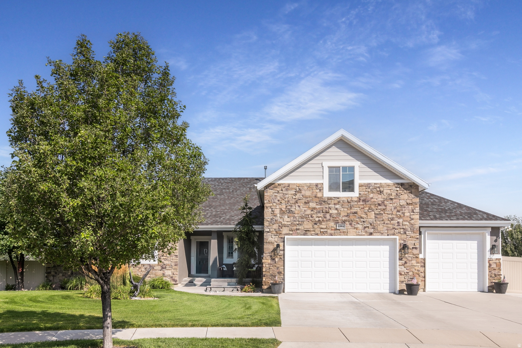 This home is exquisite on every level. This has been professionally designed and decorated. Located in the prestigious Cove at Herriman Springs community.  This home has more upgrades than we name. But the Yard! The care. The charm. The character. The views. The endless ways to enjoy! The basement, under-cabinet lighting, water heater, patio blinds/shades, trim lighting around entire home, many trees, shed, greenhouse, attic ventilation (AC Assist), and 3ft of insulation in the attic, are all new within the last 5 years.  This home also had Radon mitigation installed, she-shed, orchard with mature trees, greenhouse, great garden area.  Don't miss this amazing opportunity.