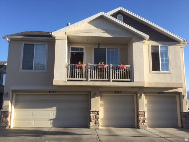 Beautiful move-in-ready 2 bedroom, 2 bath end-unit townhome in West Jordan featuring an open floor plan with vaulted 18 ft ceilings. Highlights include granite countertops, gas fireplace, hardwood HDF flooring, tile bathroom floors, ceiling fans in both bedrooms, deck for barbecuing and a kitchen with reverse osmosis water system. Primary suite offers a full bath and walk in closet. Water heater replaced in 2025; furnace in 2019. Community amenities include a pool and fitness center. Gas stove, refrigerator, dishwasher, microwave, washer and dryer included. Buyer to verify all information.
