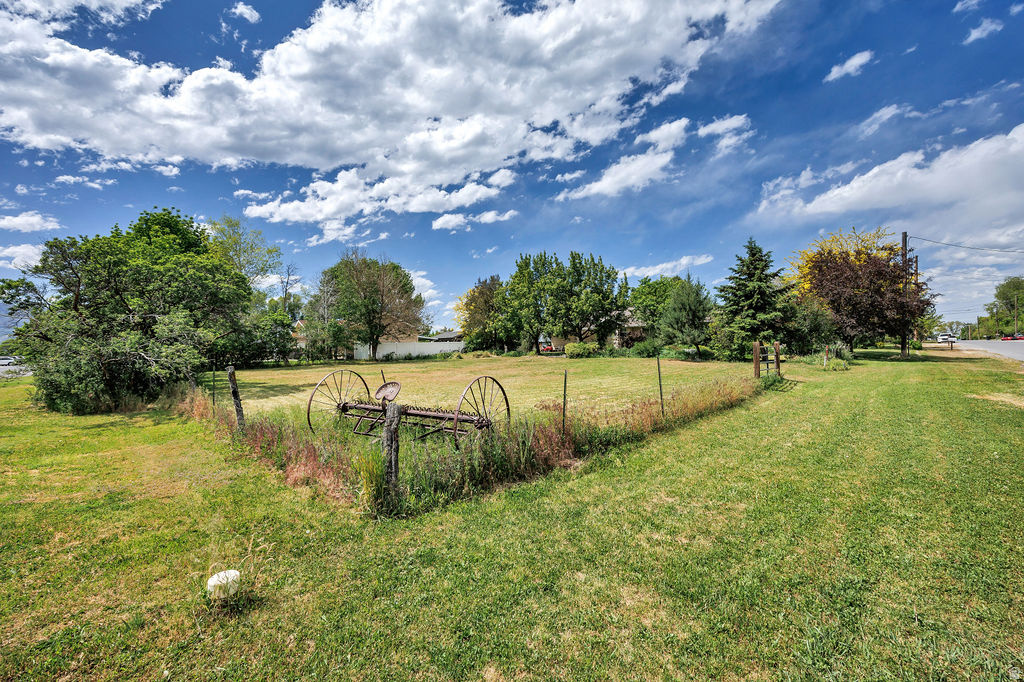 Clean, flat, vacant 0.28 acre lot is ready to build your dream home overlooking the Hyrum Reservoir! Frontage could potentially be facing south or east. City approved two-story build or agricultural pasture. Could be an Airbnb, rental property, or owner occupied. On the lot: Maple, pine, cherry trees, plum, and blackberry bushes. Fifty yards to the reservoir beach access entrance to go for a walk, a swim, boating, or fishing!  Lot can be purchased separately or as a package deal with the house, 468 S 100 E, for a discount. For more details on the house: MLS #2169481. Contact agent to discuss discount, boundary, and water on both properties. Make an offer today!
