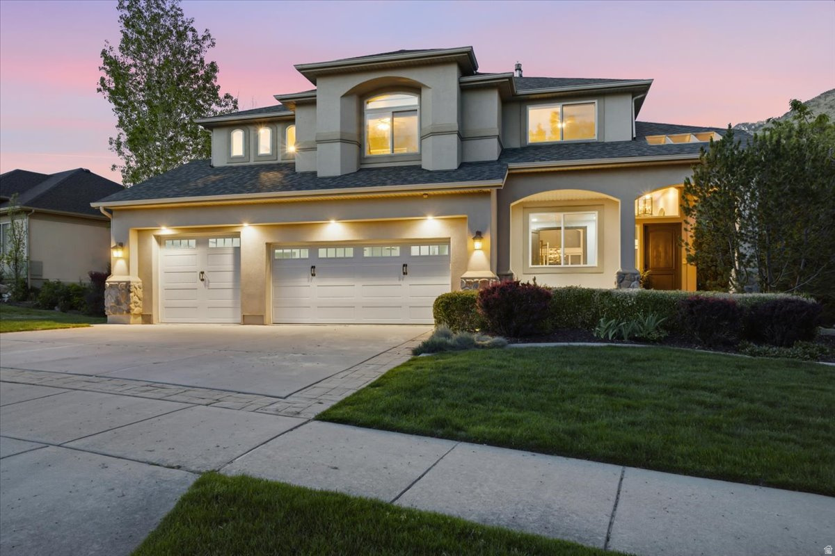 Nestled in one of Draper's most sought-after neighborhoods, this stunning two-story home has a new roof, flooring & paint. It offers the perfect blend of elegance, space, and breathtaking scenery. From the moment you step inside, you'll be welcomed by soaring ceilings, abundant natural light, and an open, inviting layout designed for both comfortable living and effortless entertaining. The spacious kitchen flows seamlessly into the large family room, creating the ideal gathering space for family and friends. Formal living and dining rooms add timeless charm and flexibility for hosting special occasions. Step outside and take in the incredible unobstructed mountain views, a truly spectacular backdrop you can enjoy every day. The walk-out basement features a fully equipped mother-in-law apartment, offering exceptional versatility for guests, multi-generational living, or potential rental income. With its prime Draper location, stunning views, and thoughtfully designed spaces, this home is a rare opportunity you won't want to miss. Square footage figures are provided as a courtesy estimate only and were obtained from County Records.  Buyer is advised to obtain an independent measurement.