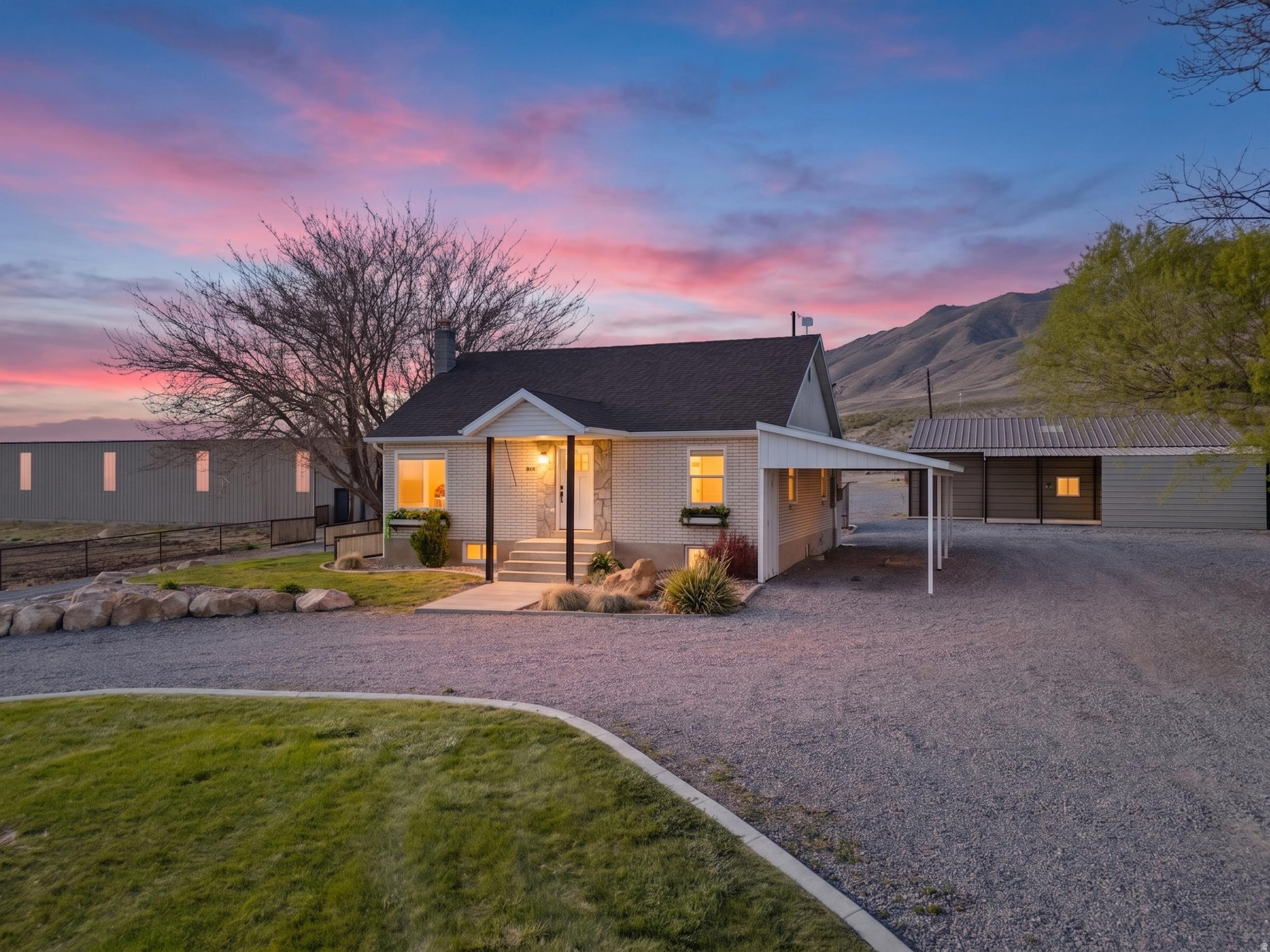 A beautifully cared-for equestrian estate in the heart of Genola! Featuring 5 large semi covered horse runs equipped with automatic waterers. A well organized tack shed with A/C. Two expansive shops provide unmatched versatility, perfect for equipment storage, hobbies, workspace, or future projects. One shop is fully heated and insulated with spray foam insulation. The charming ranch house has been thoughtfully updated, blending modern comforts with warm country character. It's the perfect place to gather, unwind, and enjoy the peaceful surroundings. Bring your family, animals, and everything that matters most there's room for it all. Take in wide open views, fresh air, and the freedom of rural living, all while enjoying a property that's turnkey and ready to go!