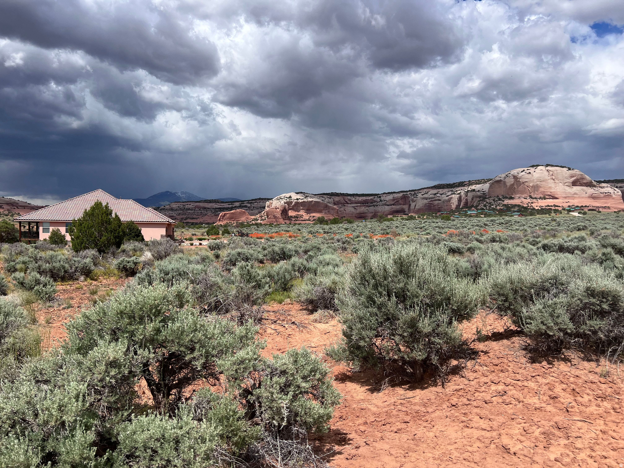 Wilson Arch home building lot adjacent to beautiful lands for exploring and hiking. Create a dreamy desert sanctuary. This lot is zoned for a single-family residence. The views are breathtaking, overlooking a large wash and surrounding red rocks. Access to miles of BLM land and near Canyonlands National Park. 25 minutes to Moab-this is the perfect and affordable place to build a beautiful home in the southeast Utah desert. This lot is ready to build with utilities on site! Power stubbed, DSL internet stubbed, water available, sewer to be septic.