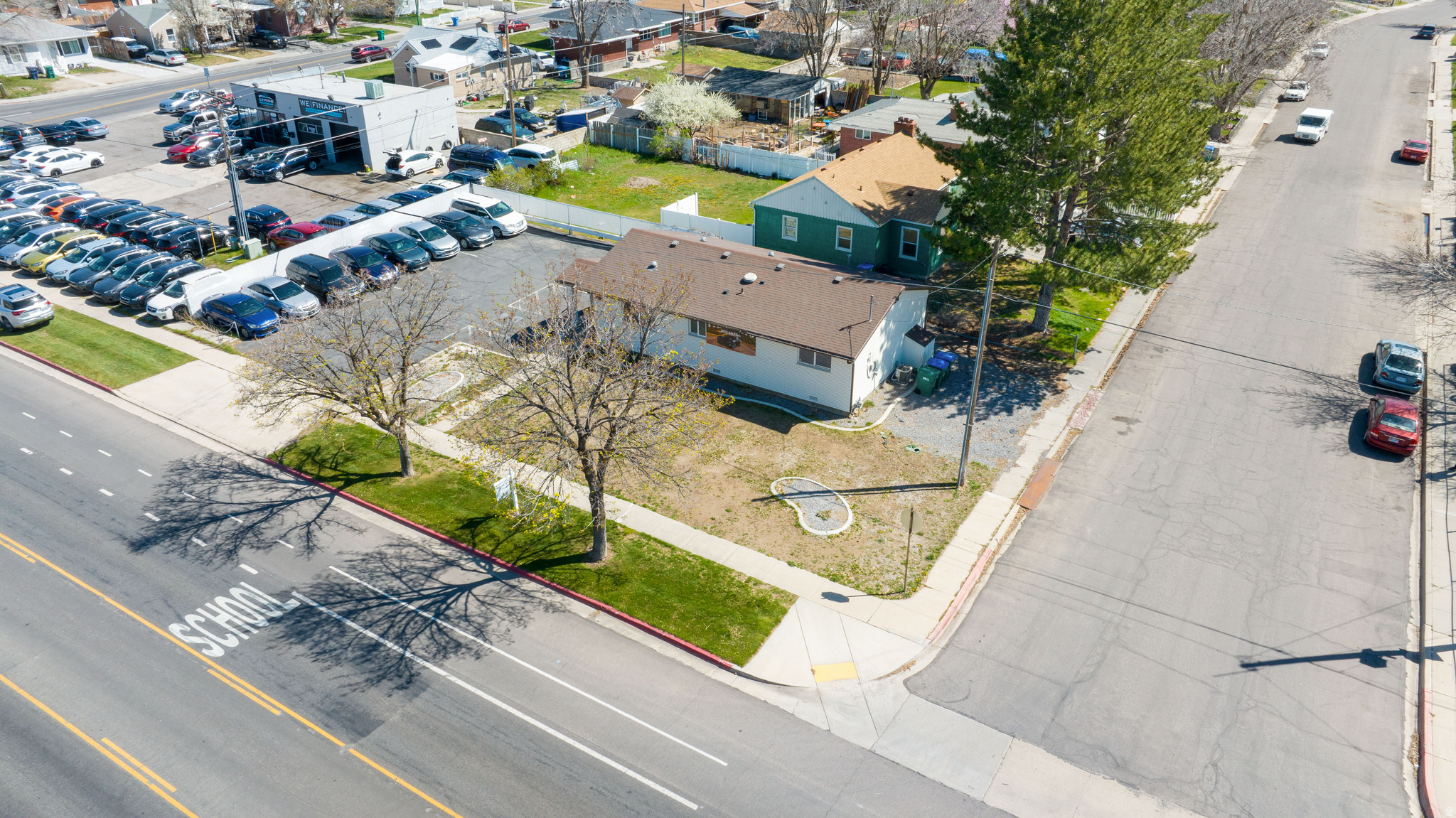 Recently remodeled brick office building, ZONED C2 which allows for many potential uses (Currently being used as an AUTO DEALERSHIP and was previously used as a spa/beauty salon). Great investment opportunity, currently renting for $3,800/mo with tenant paying utilities! The current tenant would love to stay but could vacate if desired. Ample parking, high visibility, and quick freeway access!