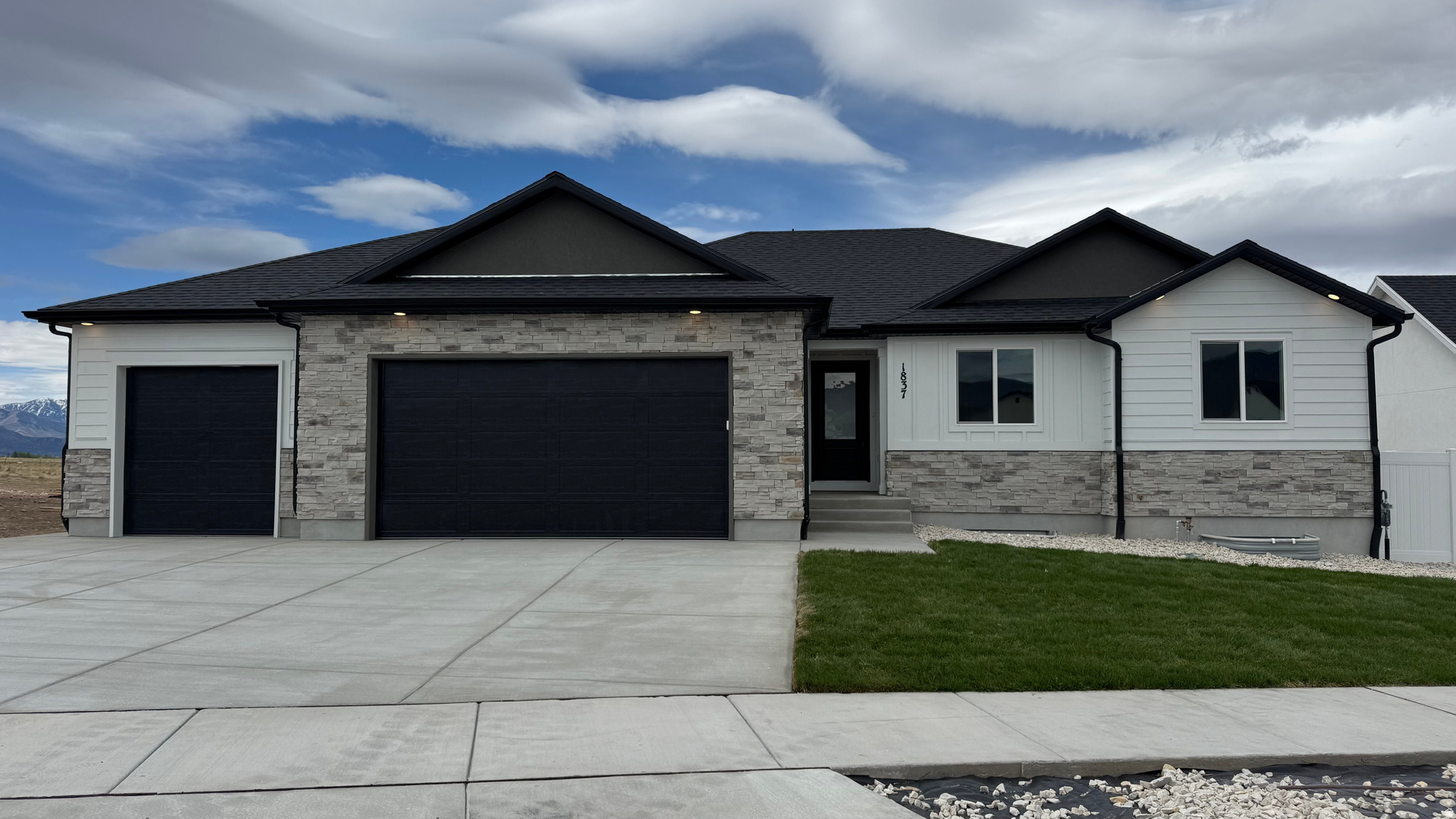 The Madeline by GTM Builders offers exceptional value with up to $24,000 in seller incentives. This spacious rambler sits on a .20 acre lot in Tooele and features 6 bedrooms, 3 bathrooms, and 2,834 total square feet, including a fully finished basement ideal for entertaining or multi generational living. Front landscaping is included, and all kitchen appliances are included, including the refrigerator. A thoughtfully designed, move-in-ready home you won't want to miss. Photos are of a previous home build, color and options are subject to change.