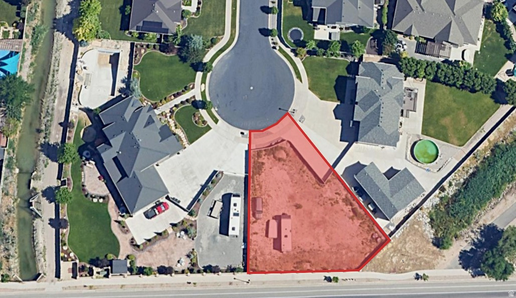 Bring your builder and your vision to this premium 0.24-acre (10,451 sq. ft.) lot in South Jordan's highly coveted Midas Creek Estates. This exceptionally spacious, flat parcel offers the ultimate blank canvas for a custom-built luxury home. Surrounded by gorgeous, high-end residences, this neighborhood offers unparalleled prestige and a true sense of community. The lot is perfectly sized to accommodate a generous floor plan and a private outdoor oasis. Location is everything, and this property delivers. Enjoy immediate access to South Jordan's best amenities, including premier shopping and dining destinations, all while retreating to a quiet, upscale neighborhood at the end of the day. Vacant land in this established luxury enclave is incredibly rare-don't miss your chance to build a bespoke masterpiece perfectly tailored to your lifestyle. Electricity and Natural Gas are stubbed to the lot line, the Water meter can is in the mow strip of the sidewalk.  Property lines are a courtesy estimate only,  buyer is advised to obtain an independent measurement.