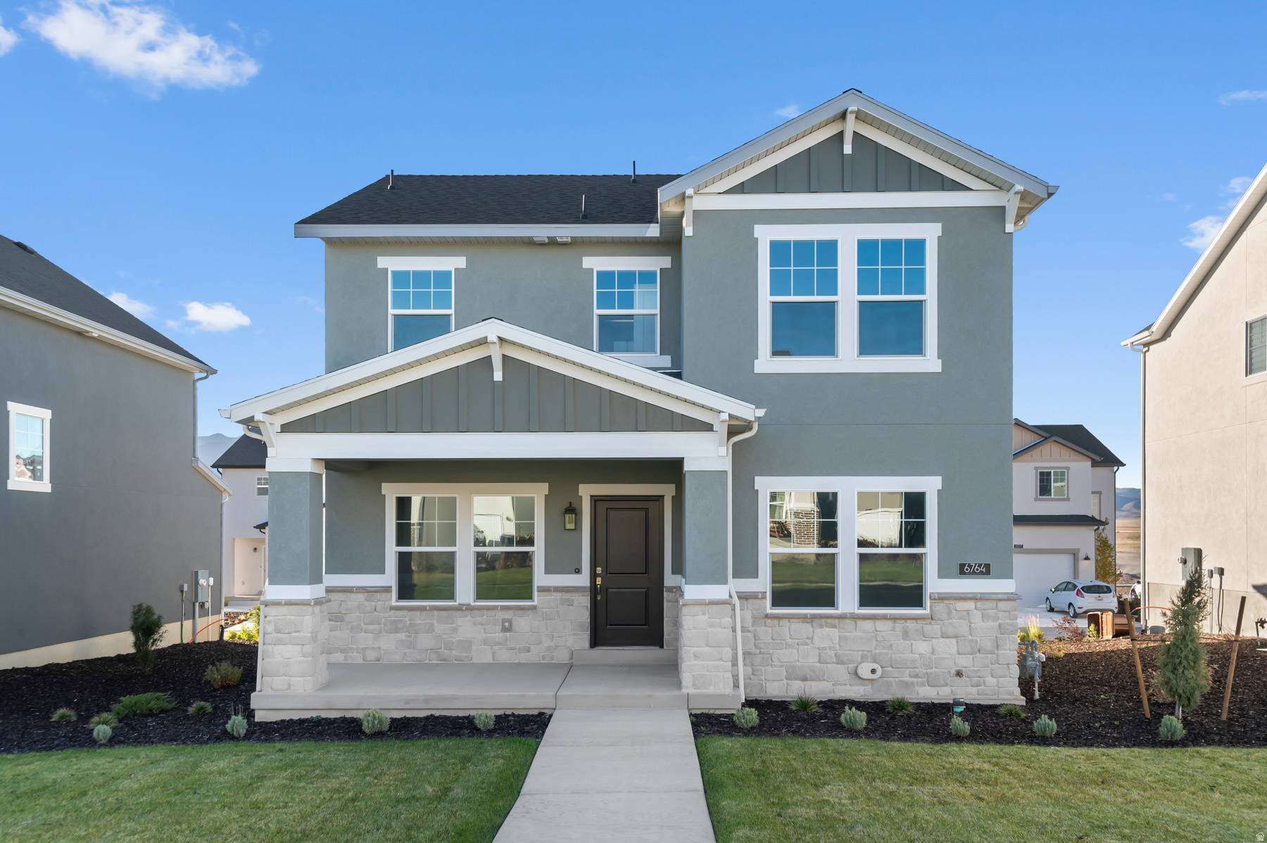 Come see this amazing brand new Salem plan with thoughtfully designed features. The modern kitchen highlights gray maple cabinets, quartz countertops, and stainless steel gas appliances. Interior amenities include laminate hardwood, vinyl tile, and carpet flooring, can lighting, and two-tone paint throughout and an upstairs loft. The owner's bathroom showcases cultured marble shower surrounds accented by brushed and satin nickel hardware. Additional features include a 40-gallon water heater, energy-efficient options, and craftsman-style base and casing, combining comfort, style, and practicality in every detail.