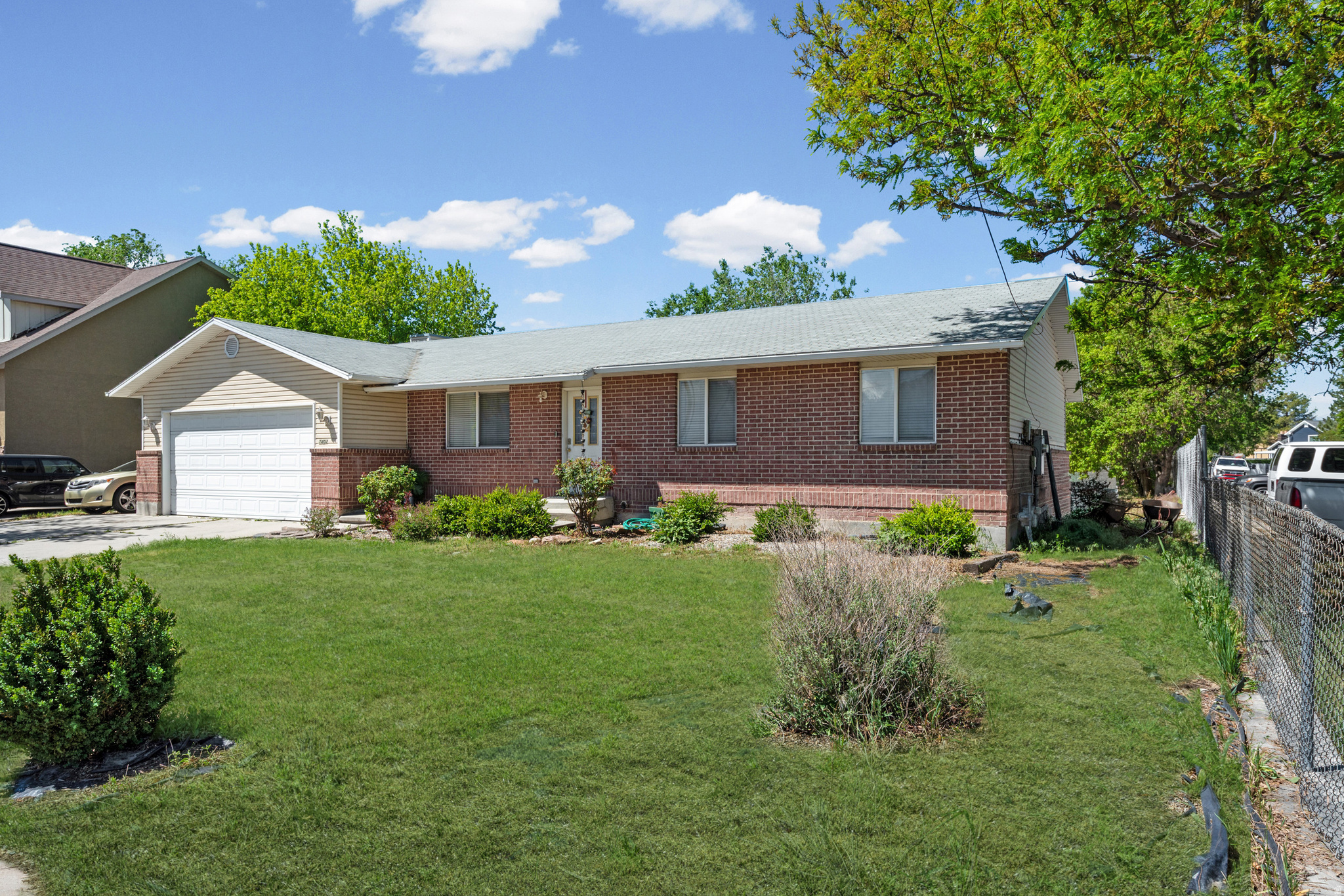 Back on the market because the buyer "didn't like his rate." This charming home is perfect for a young family wanting the space to grow into- including a basement living space with its own laundry, kitchen, bath, and entrance. The back of the home, to the west, offers almost 1/4 acre of space. To the North there is a church, meaning seclusion and quietude for the most private of buyers. This home had been FULL of belongings but to make the inspection work for the first buyer, the home was cleared out. Due to that fact, the home shows 1000% better.