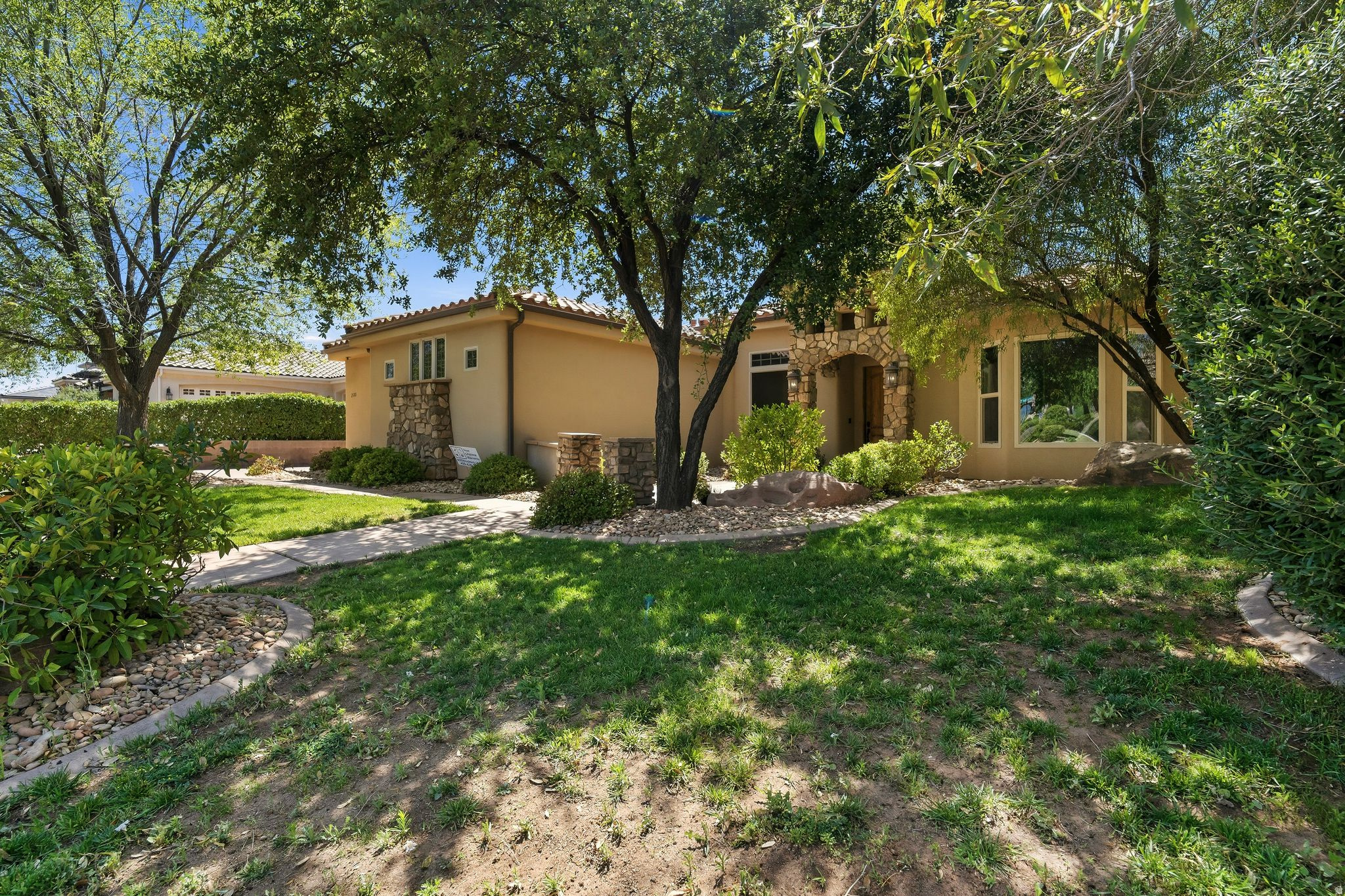Gorgeous single-family home located in an established neighborhood w/no HOA. You'll love the mature trees, plenty of space for uncovered parking, RV parking & attached 3 car garage. Inside offers 2 living rooms, custom rock detailing, hardwood flooring, granite countertops, stainless steel appliances, and 3 recently remodeled bathrooms. There are speakers in the celling in main living room, back patio, master bathroom, and Front Bedroom. CAT5e ethernet in every room. Large master bathroom w/walk-in shower & closet. Big backyard w/covered patio & storage shed.