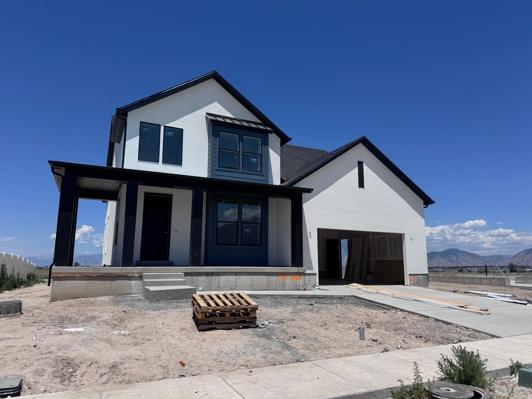 Designed for easy, modern living! Finishing in July, this home features high-end finishes, a main-level primary bedroom, and an open-concept layout that's perfect for everyday living and entertaining. Located in scenic Payson, you'll enjoy beautiful views all around, gorgeous views of Mount Timp out the back 2 story windows!!!.The McCormack Plan includes a spacious kitchen with a large pantry, plus three  upstairs bedrooms and a versatile catwalk overlooking a soaring ceiling in the great room. There is also another bedroom/flex space on the main level. The unfinished basement provides room to grow or additional storage! Move in ready mid July