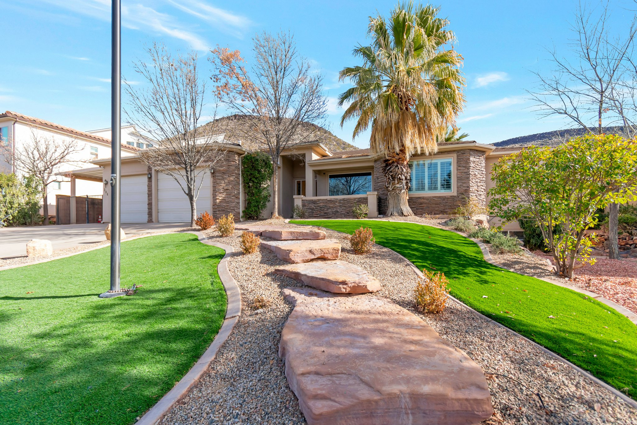 Beautiful home on a 3rd of an acre in St George with basement apartment. Spacious master suite that includes a separate tub, shower, vanity and walk-in closet. Large entertainment area, outside covered patio, raised pool area with a cover, basketball standard and firepit. All the exterior landscaping has been redone with artificial turf, new drip lines, and rock. Property has a 3 bedroom (one without a window that has been used as an exercise room in the past) accessory apartment with large kitchen, family room, and a separate walk-out entrance. Two new furnaces and A/Cs were installed this year.  Beautiful Shadow Mountain Park is located across the street with a walking path, playground, and pond. Square footage figures are provided as a courtesy estimate only and were obtained from an appraisal. Buyer is advised to obtain an independent measurement.