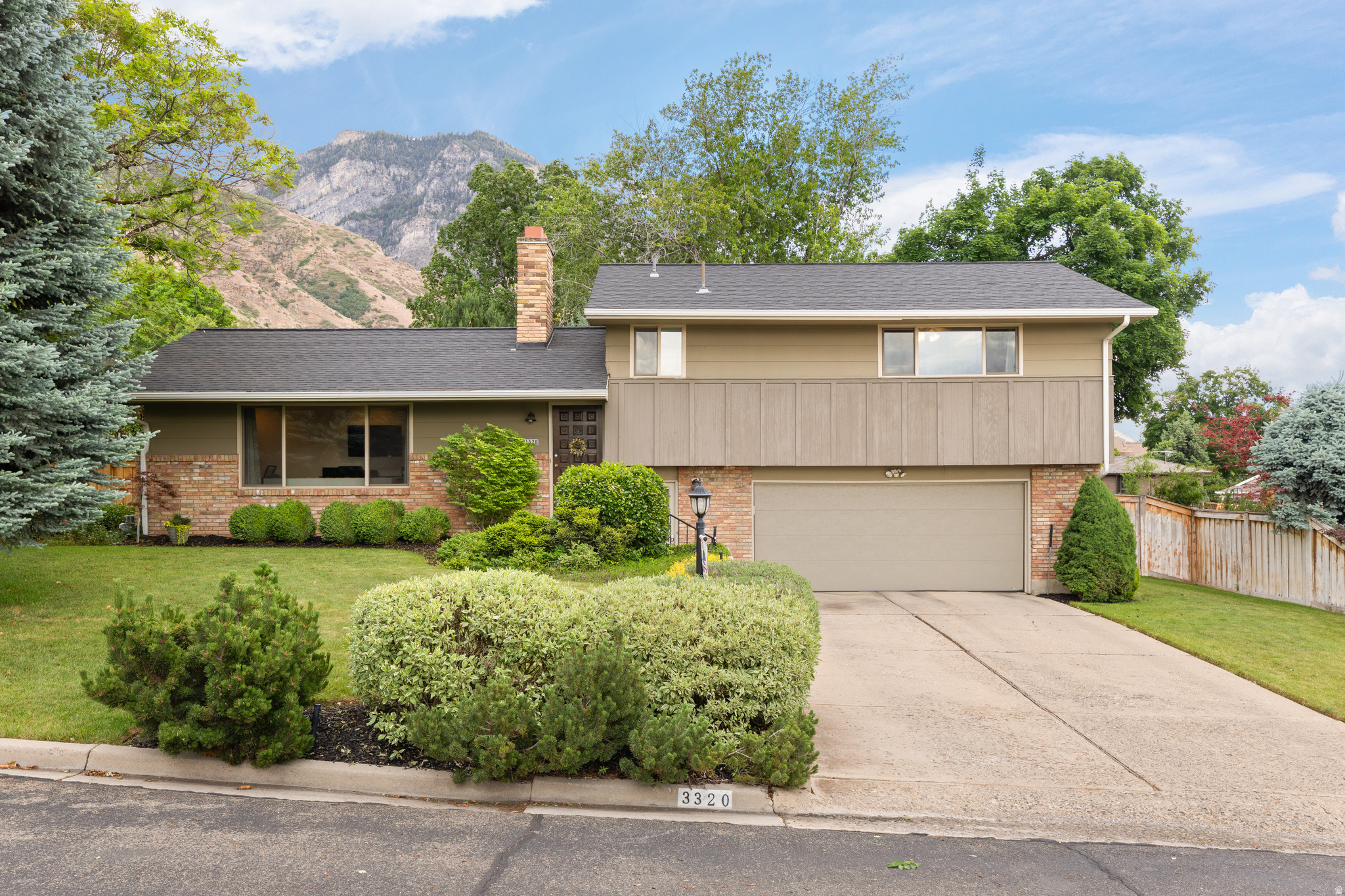Nestled in the highly sought-after Indian Hills neighborhood, this beautifully maintained home offers the perfect blend of serenity, convenience, and breathtaking mountain views. Located just minutes from Brigham Young University and within close proximity to excellent schools, this idyllic setting is one of Provo's most desirable places to call home. Inside, you'll find a meticulously cared-for residence featuring two spacious primary bedrooms, each with its own en suite bathroom, offering exceptional comfort and flexibility for multigenerational living or guests. The fully finished basement and unique walkout garage space could easily be transformed into the ultimate family gathering or entertainment room. Surrounded by mature landscaping and peaceful surroundings, this home offers both comfort and charm in an unbeatable location. A rare opportunity to own in one of Provo's premier neighborhoods-this is truly a must-see home.