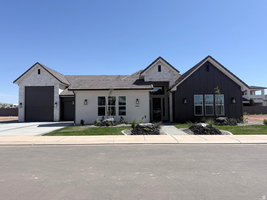 This beautiful home is situated on the east side of town and boasts features such as LVP flooring, quartz countertops, and under-mount sinks with soft-close drawers and cabinets. It includes a smart home kit, a Wi-Fi router, a programmable thermostat, and a keyless front door lock. The garage features an epoxy-coated floor and accommodates a 41-foot RV garage. Additionally, there is a 15-foot side parking space and a 30-foot backyard. The home is also plumbed for a future pool.