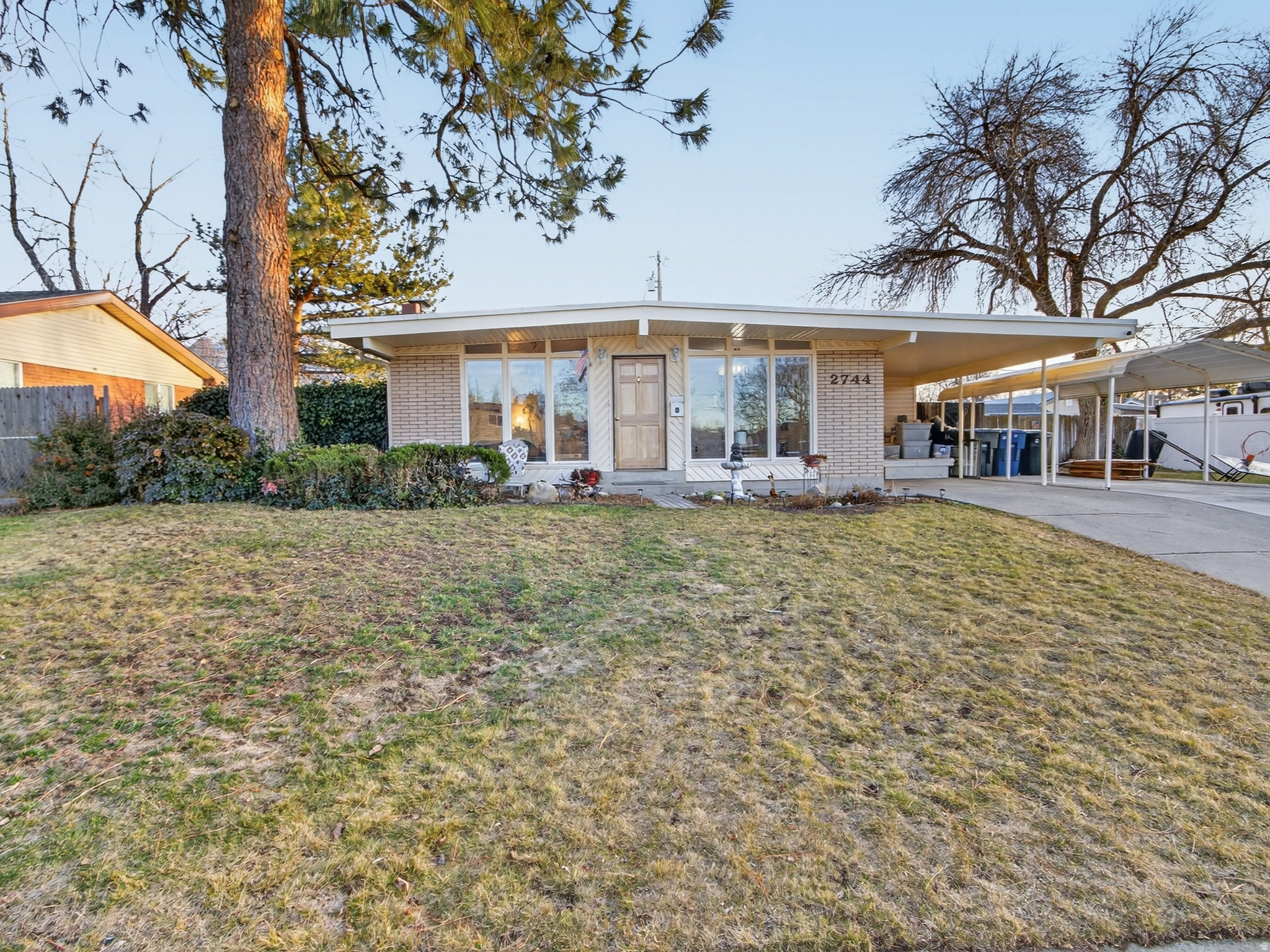 *****MOTIVATED SELLER*****Situated in one of Cottonwood Heights' most desirable neighborhoods, this beautifully maintained home blends comfort, space, and convenience. Hardwood floors span the main level, creating a warm and welcoming feel throughout. The home offers five bedrooms, two and a half bathrooms, plus a versatile lower-level den or office ideal for remote work or flex living.  Two fireplaces provide cozy gathering spaces, while the brand new basement bath with an oversized soaking tub, and private half bath in the primary bedroom add thoughtful functionality. A newer, oversized central A/C unit ensures year-round comfort.  Enjoy a fully fenced backyard with mature landscaping and automatic sprinklers-perfect for summer evenings, weekend barbecues, or quiet mornings outdoors. The basement offers generous storage to keep everything organized.  Ideally located near shopping, dining, freeway access, and within walking distance to local schools and the recreation center featuring indoor ice skating and indoor and outdoor swimming.  A rare opportunity in a prime Cottonwood Heights location-schedule your showing today.  Square footage figures are provided as a courtesy estimate only and were obtained from County Records.  Buyer is advised to obtain an independent measurement.