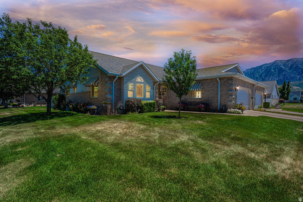 ***OPEN HOUSE Sat. June 20th 12-1 pm*** RARELY available Corner Stone condo, beautifully maintained, with OPEN concept, EPIC basement (large family room & 2nd kitchen), and PEACEFUL & private backyard! Although a 55+ community, Corner Stone currently has availability for younger buyers - a SIGNIFICANT OPPORTUNITY. Home features real HARDWOOD floors, tile, extensive can lighting, ceiling fans, a brand-new SKYLIGHT, & 2 GAS fireplaces.  CHEF's kitchen w/HUGE island for prep w/bar seating, CORIAN countertops,  GAS range, STAINLESS STEEL appliances, & LARGE pantry.  SPACIOUS primary suite includes walk-in closet, jetted tub, & shower.  Main-floor LAUNDRY includes sink, cabinets for extra STORAGE, & gas dryer hookup. Basement features a huge family room, 2 bedrooms, a kitchenette with soft-close/full-extension cabinets & microwave. STORAGE!! 2 large storage rooms, utility space & cabinets in GARAGE. INSULATED GARAGE DOORS! Enjoy the PRIVATE backyard with a massive COVERED patio, gas BBQ line, 220V outlet, & mature trees (*HOT TUB available for extra price*). HOA recently replaced roofs, gutters, and fencing. HOA also includes snow removal on driveways & walks, & has RV STORAGE (NW corner of community)! NEW water heater (2026); newer furnace & A/C (4-5 years old). Location!!  BUYER/AGENT to verify all, sq footage per county records.