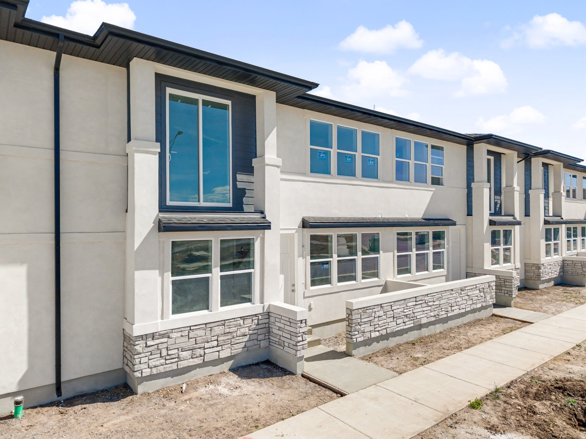 This 4-bedroom, 2.5-bath mid-row townhome delivers more than expected, featuring a true laundry room, walk-in pantry, private balconies, and open living spaces with modern finishes. Every detail, including the 2-car garage, was designed for comfort and convenience. Location is everything: set in a prime Springville neighborhood, you are just 1 minute from schools and parks, 2 minutes from Smith's Marketplace, and 3 minutes from I-15. Use our preferred lender to take advantage of $5,000 in available incentives to buy down the rate, or reduce the monthly payment and help make this dream home yours!  First-time buyers may also qualify for up to 10% or $40,000 in down payment assistance (DPA) to lower upfront and closing costs. With Unit 743 recently appraising for $475K, this home offers incredible value. Buyer to verify all information.