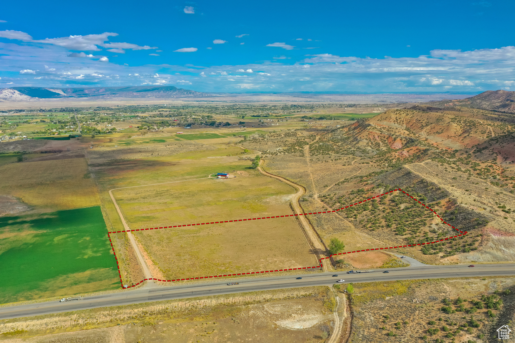 Unlock the potential of this highly desirable commercial land offering outstanding highway frontage and unmatched visibility. Strategically positioned in a high-traffic corridor, this property sees a steady and growing daily traffic count, making it an ideal location for a wide range of commercial developments. Whether you're looking to build a retail center, office complex, restaurant, service station, or a mixed-use facility, this site provides the location advantage needed to maximize your return on investment. Don't miss this rare chance to secure a high-impact commercial location in one of the most visible and accessible spots in the area. This location offers crown jewel views of all of Vernal. All information is deemed to be reliable. Buyer is advised to obtain independent information.
