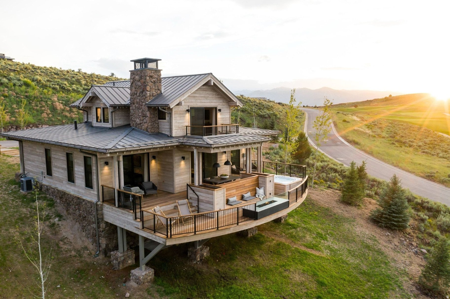 This inviting Kestrel Cabin provides 2 bedrooms plus a bonus bunk nook. Enjoy a beautifully designed, fully appointed cabin where luxury living meets rustic elegance. Outdoor living space includes expansive, multi-leveled deck space with a seven-person hot tub, grilling station, dining and lounging areas, fire table, outdoor heater, speaker, and incredible views. These cabins also include two-car garages, as well as the use of a six-person Moto EV for fun, easy transportation to all amenities. Owners at The Residence Club have a guaranteed six weeks of use per year, including three in the winter and three in the summer. Owners may swap, as well as pick up additional (unused) weeks and only pay the weekly cleaning fee.  Residence Club Ownership has quickly become one of the favored forms of ownership at VR! Call to learn about the benefits of fractional ownership in Residence Club ownership or to schedule a tour. Victory Ranch is a private, four-season community amidst 6,250 pristine acres along four miles of the Upper Provo River. Amenities include an 18-hole Rees Jones golf course, world-class fly-fishing, miles of mountain biking and hiking trails, 5-stand shooting facility, 4x4 adventures, snowmobiles, ice skating rink, backcountry yurts, fishing ponds, multiple restaurants, a ski-in/ski-out lodge in Park City and more than 3,500 acres of untouched backcountry. The Post Clubhouse includes our concierge, heated pool, hot tubs, fire pit and seasonal grill. Our newest amenity, The Barn, features a Pizza and Ice Cream Parlor, Art Studio, Game Room and Indoor Basketball and Sport Court as well as a Fitness Center, and Spa. The new swimming pool, waterslide, tranquil stream and pond, tennis, pickle and paddle courts, and event lawn will be sure to provide hours of family fun. Victory Ranch is approximately 15-minutes from Deer Valley and 25 minutes to Park City. Interior and Exterior shots are for illustrative purposes only and are not of the actual property, but of a similar model.