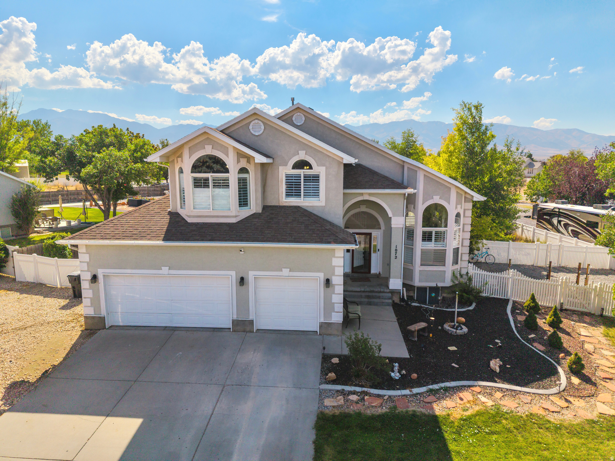 This impressive 7 bedroom, 4 bathroom, 2-story home sits on nearly half an acre! Located in one of Grantsville's most sought out neighborhoods. This home offers the perfect balance of peaceful living while remaining just minutes from schools, parks, and everyday conveniences. Whether you're looking for room to grow or a home with income potential, this property checks all the boxes! Call today for a showing! The basement features a separate ADU with current tenants, see agent remarks for details. Square footage figures are provided as a courtesy estimate only and were obtained from county records.  Buyer is advised to obtain an independent measurement.