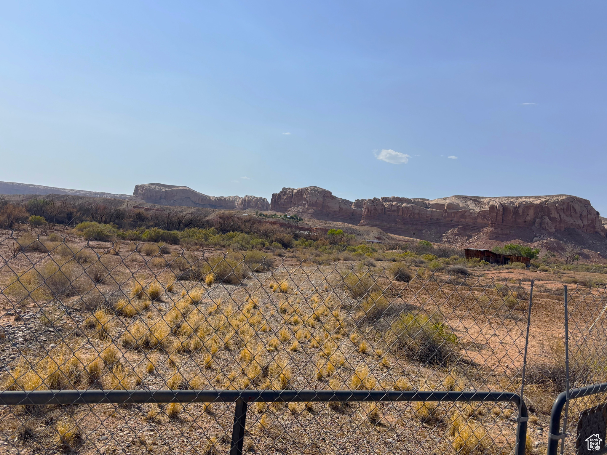 Prized, in town location, 2.5 acres tucked away at the end of Black Locust Ave in scenic Bluff, UT. Build  your home or bring your RVs to this private lot. Hook ups are in place. Begin your adventures on foot from this very spot, or travel to amazing places such as Monument Valley, San Juan River, Natural Bridges National Monument, Valley of the Gods, and Hovenweep National Monument to name a few. Bluff is a designated Dark Sky community. The starry skies are amazing here. The lot is fully and securely fenced, with utilities connected for your convenience. Camp trailer and out buildings are on site. An appointment is necessary to open up the gate if you want to walk the lot. All information is deemed correct, to be verified by buyer.