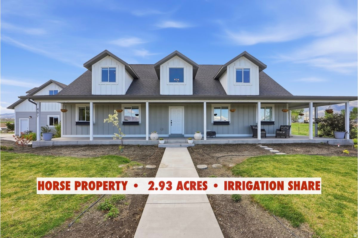 $50,000 PRICE REDUCTION!!!  SELLER IS ALSO OFFERING $8,000 toward CLOSING COSTS when you use our preferred lender ...***...      LUXURY HORSE PROPERTY on nearly 3 ACRES, OVERSIZED GARAGE, IRRIGATION SHARE, magnificent MOUNTAIN VIEWS, and NO HOA!!!     This is COUNTRY LIVING AT ITS BEST!!!      Imagine waking up to PEACE, QUIET, and WIDE-OPEN SPACE, where you have the PRIVACY to truly relax, unwind, and live life on your own terms.    The OVERSIZED GARAGE could fit multiple cars in tandem, and still have additional space for tools, equipment, or recreational storage!    Plus RV PARKING, giving you plenty of room for all your cars, trailers, and toys.    The home was built with high-quality materials and custom-designed with SOARING CEILINGS, HARDWOOD FLOORS, GRANITE COUNTERTOPS, and much more!!    It's also a MAIN-LEVEL LIVING home with 4 Bedrooms and a LAUNDRY ROOM conveniently located on the main floor, while 2 additional Bedrooms can be found on the second floor.    The beautiful PRIMARY BEDROOM is spacious and includes a spa-like ENSUITE BATHROOM and DUAL WALK-IN CLOSETS.    The GREAT ROOM was beautifully designed with an OPEN LAYOUT and OVERSIZED WINDOWS, brightening the space with natural light and creating an inviting area, perfect for gathering or hosting guests!    There is plenty of room for relaxing and gathering, plus ROOM FOR FUTURE EXPANSION with the unfinished basement, ready to become whatever your vision brings to life.    The WRAP-AROUND PORCH, with stunning MOUNTAIN VIEWS, will quickly become your favorite place, whether it's a quiet morning or a cozy evening watching the sunset.    Sitting on nearly 3-ACRE with ONE IRRIGATION SHARE, this home is perfect for GARDENING, LIVESTOCK, and creating the lifestyle you've been dreaming about.    LOCATION is unbeatable! Enjoy the BEST OF BOTH WORLDS with peaceful, rural living while being just 5 minutes from Schools, Restaurants, and Grocery Shopping, and about 30 minutes to Salt Lake City.    This is more than just a home, it's a LIFESTYLE you've been waiting for - Come see it today!     Information and measurements are provided as a courtesy. Buyer is advised to obtain their own measurements and verify all information.