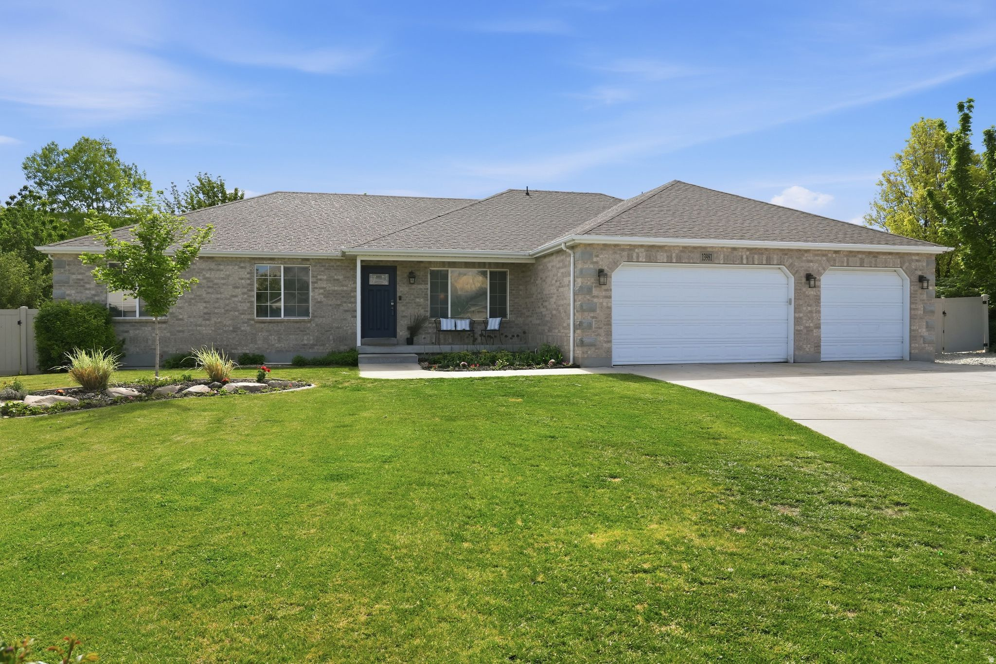 Open house Saturday, May 30th from 11-1.  Freshly renovated and set on nearly 1/3 acre, this open-concept home blends updated living with space to spread out, gather, and grow. The vaulted main living area flows seamlessly into the open kitchen and dining space, creating the perfect setup for holidays, entertaining, and everyday life. The spacious primary suite features a beautifully updated bath with a soaking tub and walk-in shower. Large windows throughout the home bring in natural light and views of the mature landscaping. Outside, the large backyard offers room to create your dream outdoor retreat with fruit trees, berry bushes, garden beds, RV parking potential, and space to play, relax, or entertain. Tucked into a quiet cul-de-sac with mountain views and a 3-car garage, this home offers the rare combination of renovated interiors, a functional layout, and a lot size that is hard to find. Located just minutes from Rosecrest Park, Rosecrest Splash Park, W&M Butterfield Park, several schools, and Mountain View Village with shopping, dining, and entertainment options nearby.