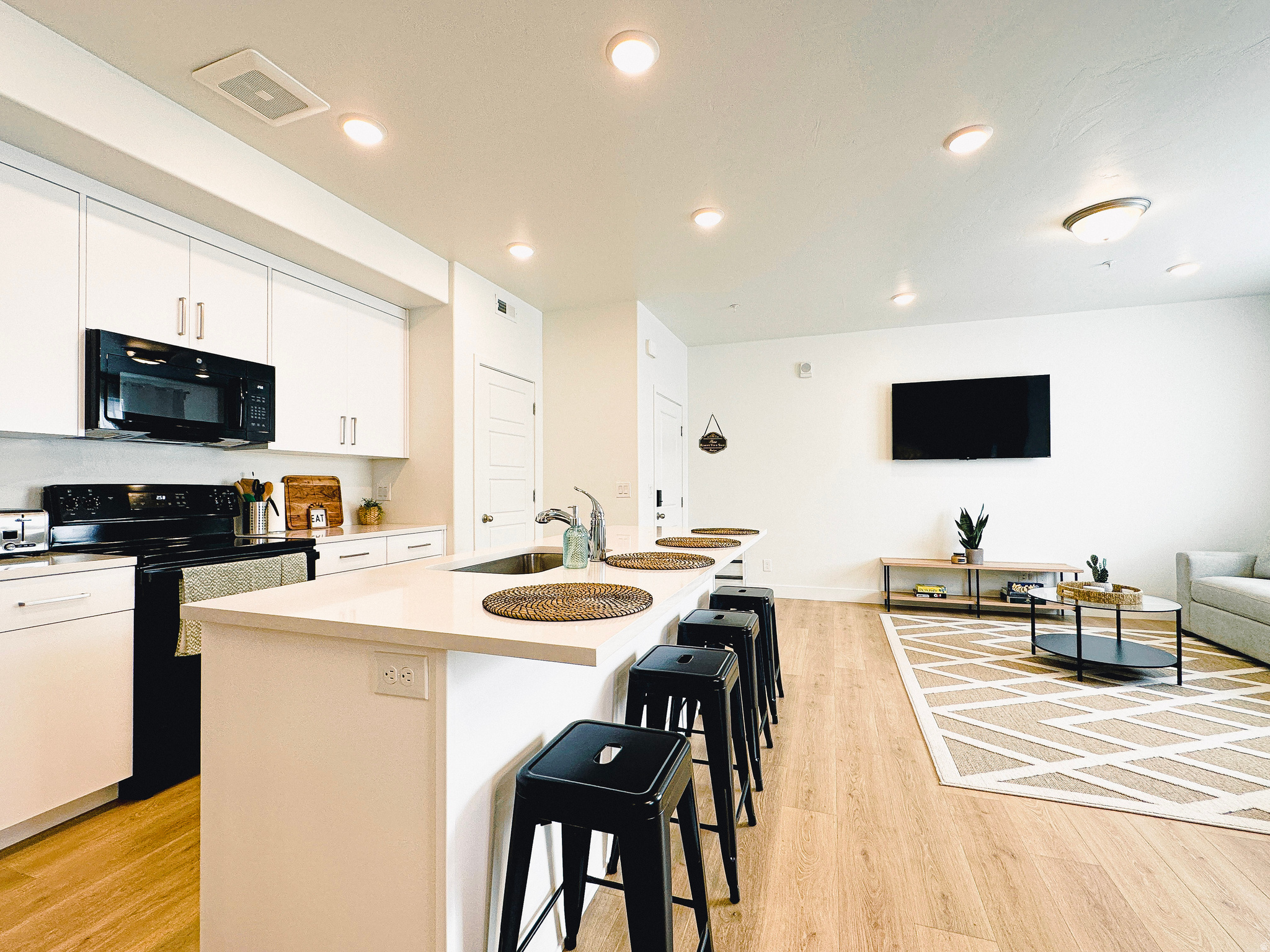 Beautifully maintained 1258 sq ft condo in the heart of American Fork! This inviting unit features an open-concept layout with abundant natural light, creating a warm and welcoming atmosphere. The kitchen offers ample cabinet space and flows seamlessly into the living and dining areas, perfect for everyday living or entertaining. 3 Spacious bedrooms and 2 bathrooms provide comfort and functionality. Enjoy resort-style HOA amenities including a pool, parks, pickleball courts, and scenic walking paths. The HOA also covers water, sewer, trash, and snow removal, making for easy, low-maintenance living. Conveniently located near American Fork shopping, dining, parks, and easy freeway access. Ideal for first-time buyers, investors, or anyone seeking low-maintenance living! Buyers agent to verify information. Option to purchase with furniture! Please note, the condo is currently occupied. Please give us 24-48hrs notice for showings. Thank you!