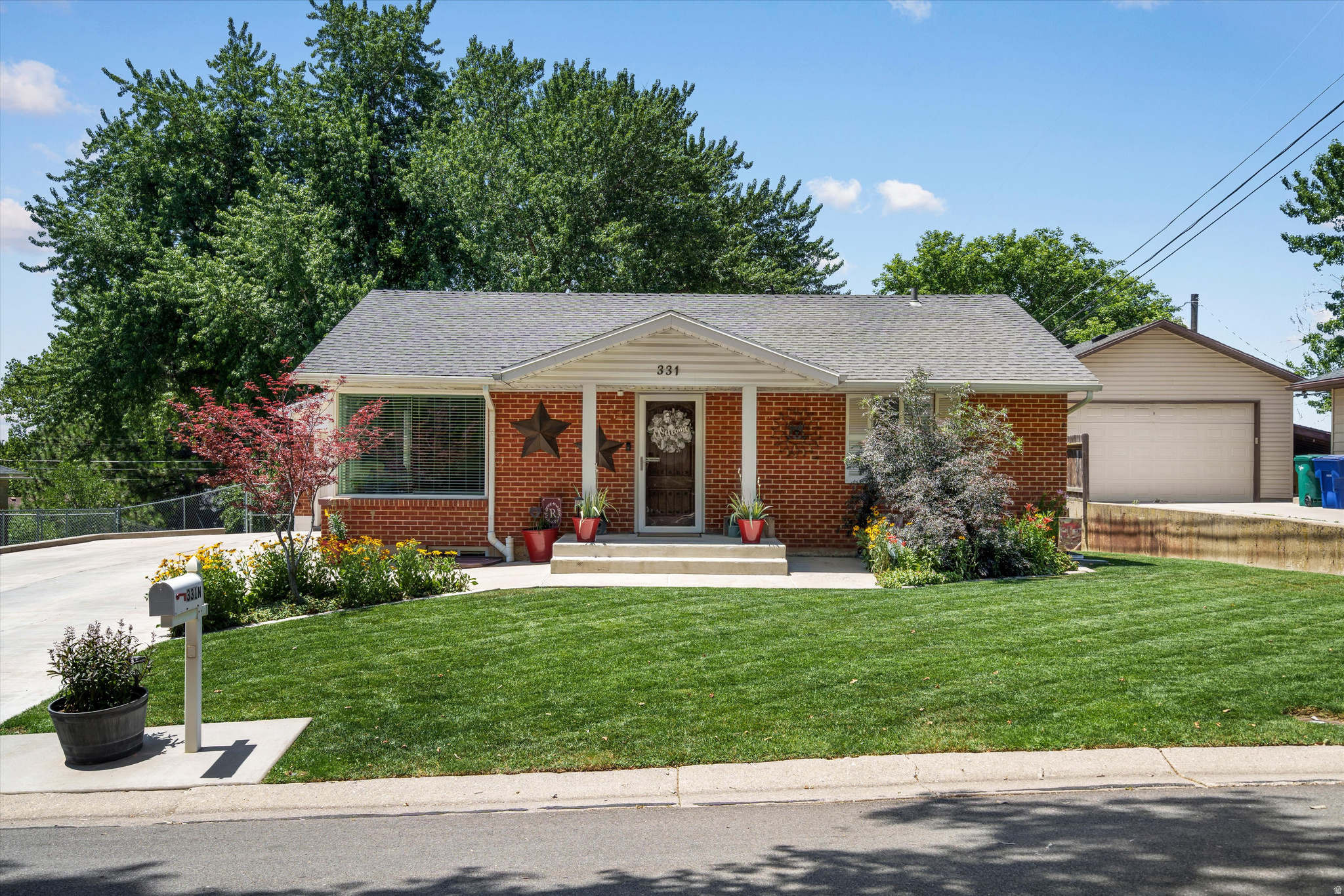 This charming brick home blends timeless character with smart updates throughout. The lower-level family room doubles as a gorgeous primary suite- think fireplace, built-ins, and a walk-in closet big enough to impress. New HVAC (only 2 years old!) keeps things comfortable no matter the season. Outside, the meticulously kept yard is your private retreat, perfect for patio hangs on warm summer nights. Garage? Check! RV parking? Check! Oversized storage shed? Check! And the location? Minutes from hiking trails, biking paths, rivers, ski resorts, and the best of downtown Ogden. Come see it before it's gone!