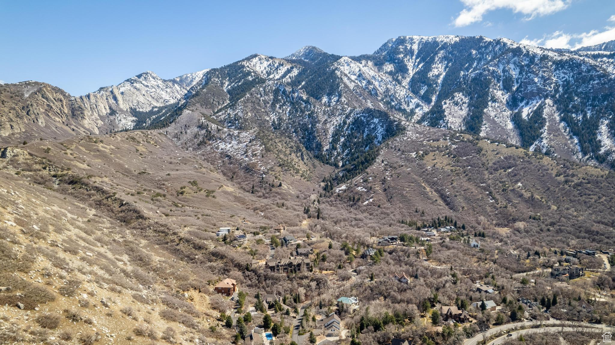 Build your dream home on this exclusive 2.98-acre estate lot, located on a private cul-de-sac in the gated Seven Springs subdivision. This prime property offers unobstructed west and south-facing views of the Salt Lake Valley, with the Wasatch Mountains as a stunning backdrop. Located on the east bench of Sandy, the property is just minutes away from world-class skiing, hiking, mountain biking, and other outdoor activities. This is an ideal opportunity to build your custom home in a tranquil and desirable setting.