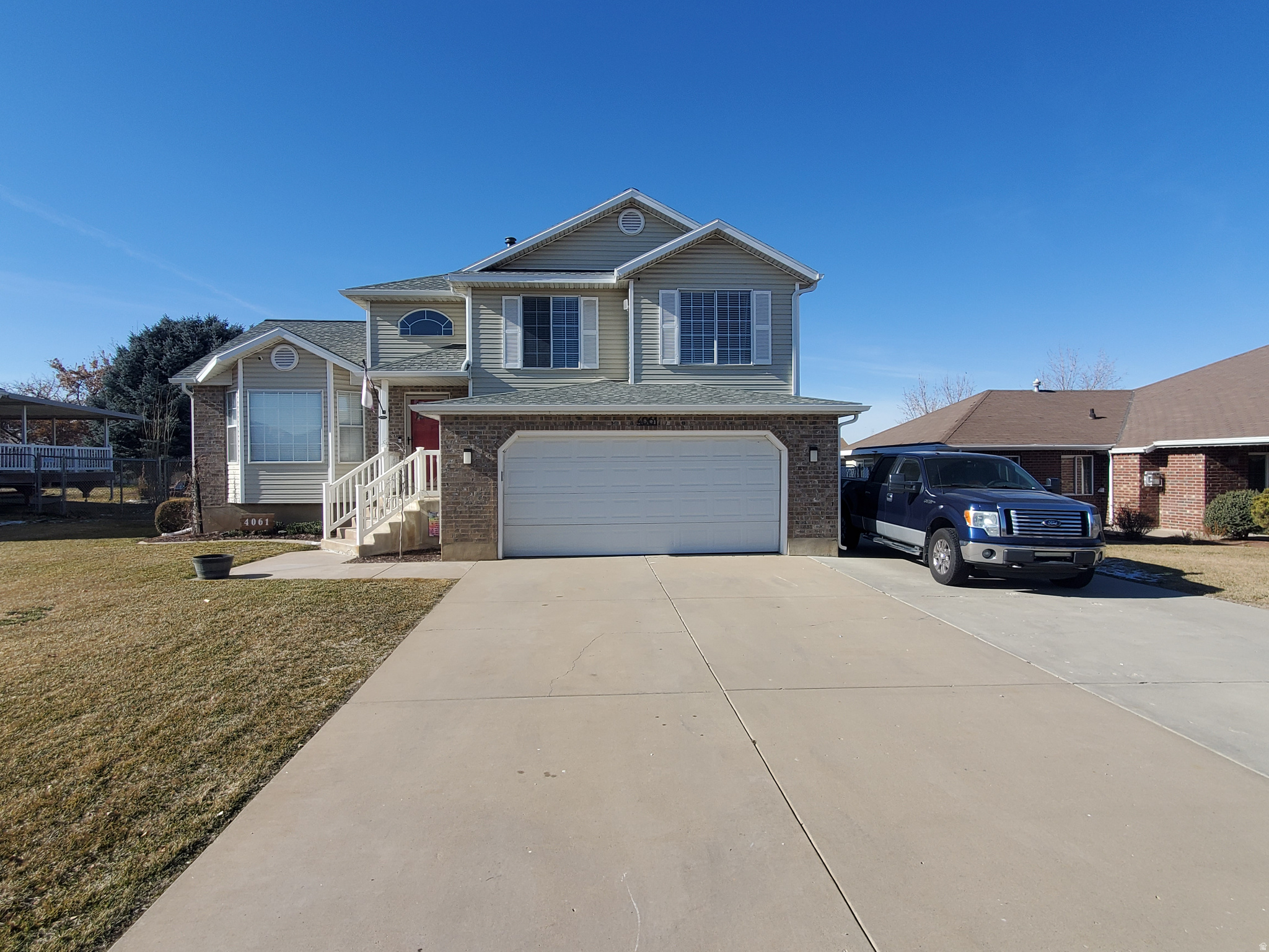 Call to schedule your showing of this beautiful home located in a desirable Roy neighborhood. Enjoy peace of mind knowing all the recent upgrades include a new roof/gutters, a new furnace, remodeled bathrooms, new flooring downstairs, and a new water heater. The main floor is open and spacious with vaulted ceilings and lots of windows. You love the big kitchen with tons of storage and counter space, a pantry, newer appliances, an eat-in breakfast bar, and an adjacent dining area. This floor plan includes both a formal living area and a large family room with a gas fireplace. Downstairs allows for a simple door conversion that would create an ensuite with a 4th bedroom option and its own private bath, which was recently finished. The fenced yard is huge with Plum and peach trees and lots of grass, offering a perfect place for the kids and pets to romp! The driveway is also extended and will easily accommodate extra vehicles, RVs, trailers, and boat parking. Call to schedule your private showing today.