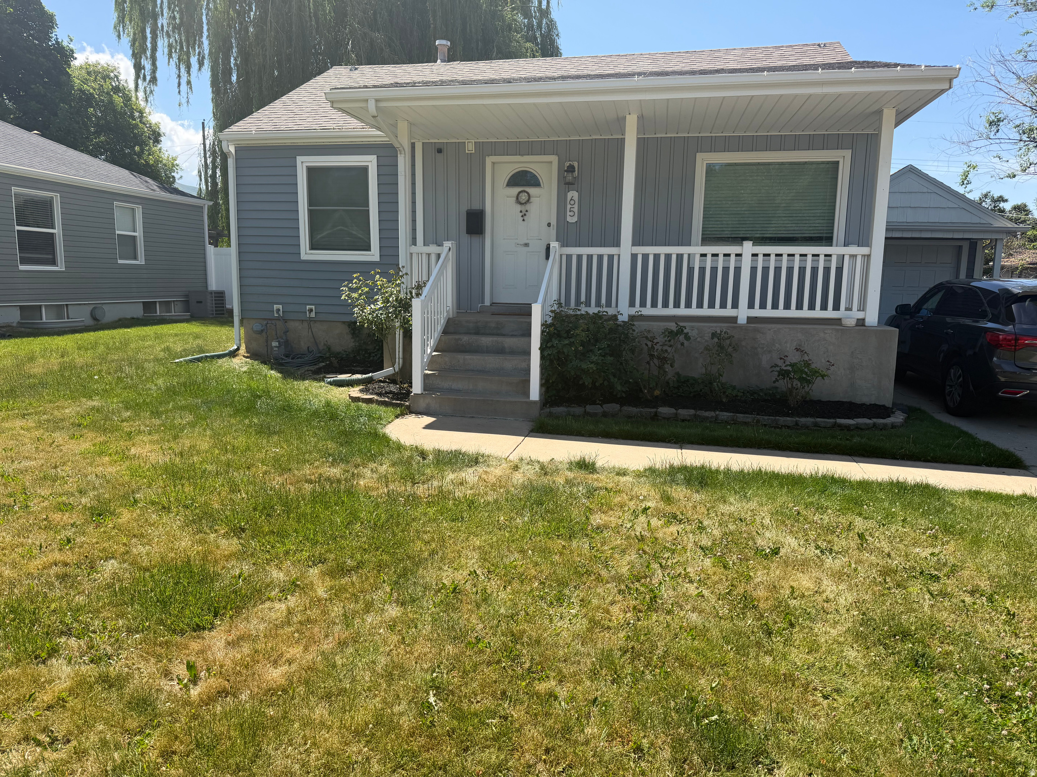Welcome to this charming home located in the heart of Bountiful, nestled in a quiet neighborhood just minutes from schools, parks, I-15, and a variety of shopping and dining options.  The main floor features a spacious living and dining area filled with natural light, along with a functional kitchen, a full bathroom, one bedroom, and an additional office that can easily serve as a bedroom.  Downstairs, you'll find even more living space with a comfortable family room that includes a built-in office area, an additional bedroom, a  bathroom with a shower, a large laundry area with washer and dryer, and a dedicated storage room.  The detached garage offers convenient parking for one vehicle and extra storage, complete with a newly installed automatic garage door.  Step outside to a fully landscaped and fenced backyard with beautiful mountain views and no backyard neighbors, offering both privacy and space to enjoy. The yard is perfect for entertaining year-round, featuring a large grass area, a concrete pad with a basketball standard, a designated garden space, and a shaded deck-ideal for summer evenings and outdoor gatherings.