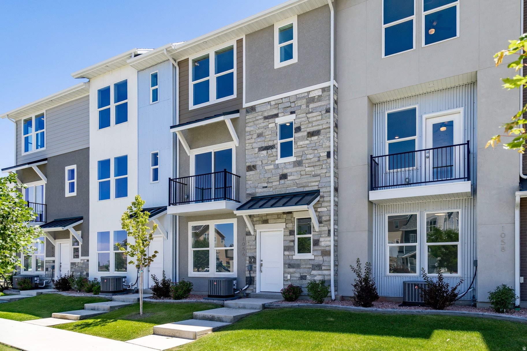 This is a Biltmore floor plan at the Ridge at Spanish Fork. It is one of our most popular three-bedroom townhomes. Use our preferred lender and the builder is offering a $10,000 credit for a rate buydown or for closing costs. The Biltmore layout has been popular because all three bedrooms are conveniently located on the top floor. It includes a family room on the main level. The second floor is entirely open, creating a perfect setting for entertaining, with a spacious family room, dining area, and a well-equipped kitchen. Additionally, it is our only three-bedroom plan with a back deck. The top floor boasts an impressive primary suite, alongside two more bedrooms and an additional full bathroom. The Ridge at Spanish Fork is a beautiful townhome community located on the east end of Spanish Fork. The Ridge has a clubhouse with a fitness center, an indoor/outdoor pool, new pickleball courts, and a dog park. The development is conveniently located near shopping (there is a grocery store across the street and Costco is just down the road), restaurants, schools, and only minutes from I-15 and the mouth of Spanish Fork Canyon. The Ridge offers two, three, and four-bedroom floor plans. There is new inventory available and we also work with investors. Come and tour the model home and choose your new townhome!