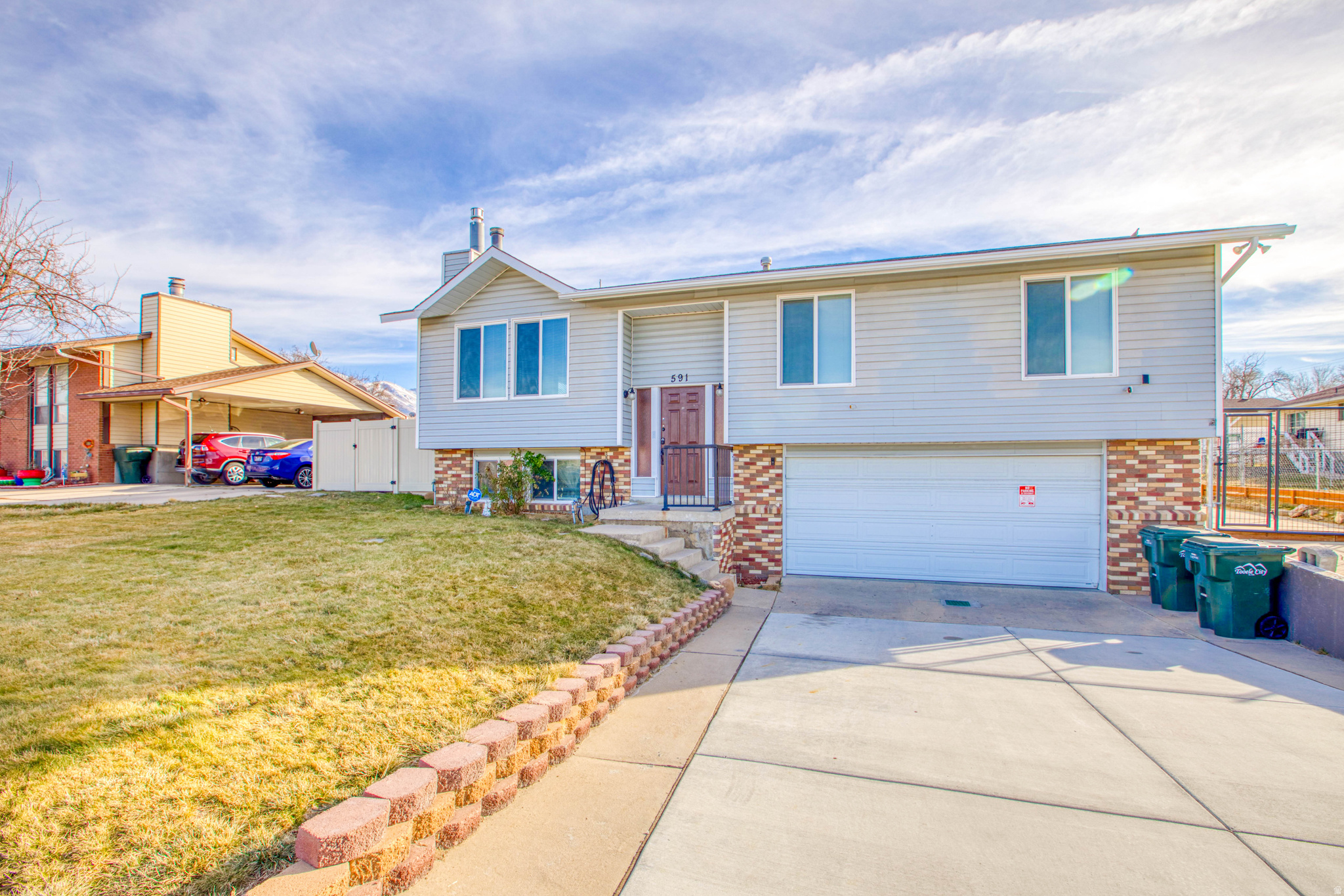 This beautiful home has the main floor separated from the basement to be used as a Mother-In-Law apartment or a rental. New flooring, new carpet & new cabinets. It comes with 2 washing machines, 2 dryers, & 2 refrigerators.