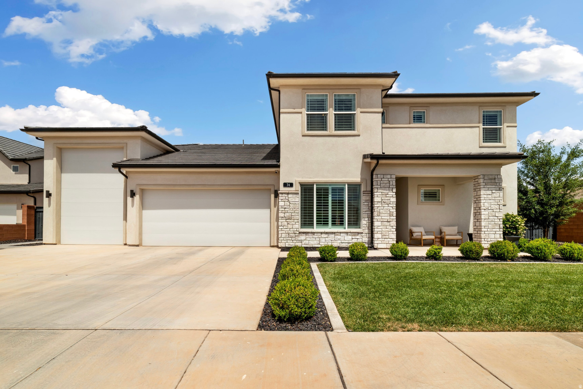 Experience high-end craftsmanship and an unmatched outdoor lifestyle in this stunning custom home located in Washington's desirable Whitworth Estates. Situated on a generous 0.32-acre lot, this 4-bedroom, 3.5-bathroom residence spans 2,772 sq. ft. of meticulously designed living space. The open-concept interior is anchored by a dramatic two-story, floor-to-ceiling fireplace in the great room, complemented by custom built-in cabinetry throughout. The chef's kitchen features upgraded appliances and flows seamlessly into the dining area, perfect for hosting. Each room is finished with professional window coverings and ceiling fans for year-round comfort. The backyard is a true private resort, professionally landscaped and fully fenced. Amenities include a full-sized, lighted pickleball court with a basketball hoop, a putting green, a splash pad, and an in-ground trampoline. For relaxation, enjoy the rock water feature, hot tub, and custom fire pit. The property is also "future-ready" with concrete pads and plumbed utilities already in place for additional projects. Car and outdoor enthusiasts will appreciate the spacious RV garage, complete with custom storage solutions. This is a rare find that combines luxury, recreation, and functionality.