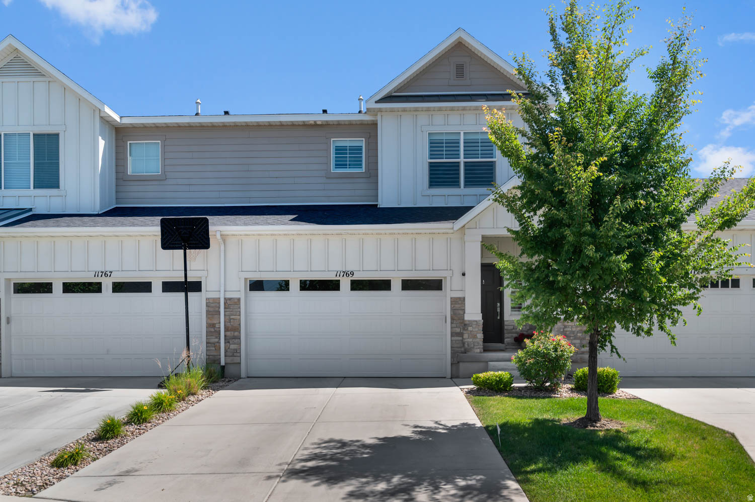 Welcome to 11769 S Nigel Peak Ln, a beautifully maintained townhome in Draper's highly sought-after Cove at Kimballs community. Offering 2,669 square feet of living space, this move-in ready home features 4 bedrooms, 2.5 bathrooms, a newly finished basement, and an open-concept floor plan designed for both comfortable living and entertaining.  The main level showcases a spacious great room, granite countertops, a large center island, gas range, abundant cabinetry, and seamless flow between the kitchen, dining, and living areas. Upstairs, the primary suite features a walk-in closet and private ensuite bathroom, while additional bedrooms provide flexibility for family, guests, or a home office.  The recently finished basement adds valuable living space and includes a fourth bedroom/flex room with an egress window, making it ideal for guests, recreation, fitness, or remote work. The remaining unfinished basement area is currently used for storage and offers the opportunity for a future full bathroom, providing excellent potential for additional customization and value.  Additional highlights include smart home features, a dedicated electric vehicle charging outlet in the attached 2-car garage, community-maintained landscaping, and convenient access to shopping, dining, parks, trails, schools, Lone Peak Hospital, TRAX, I-15, and Silicon Slopes. Combining thoughtful updates, functional living space, and an exceptional Draper location, this home offers the perfect balance of comfort, convenience, and future potential.
