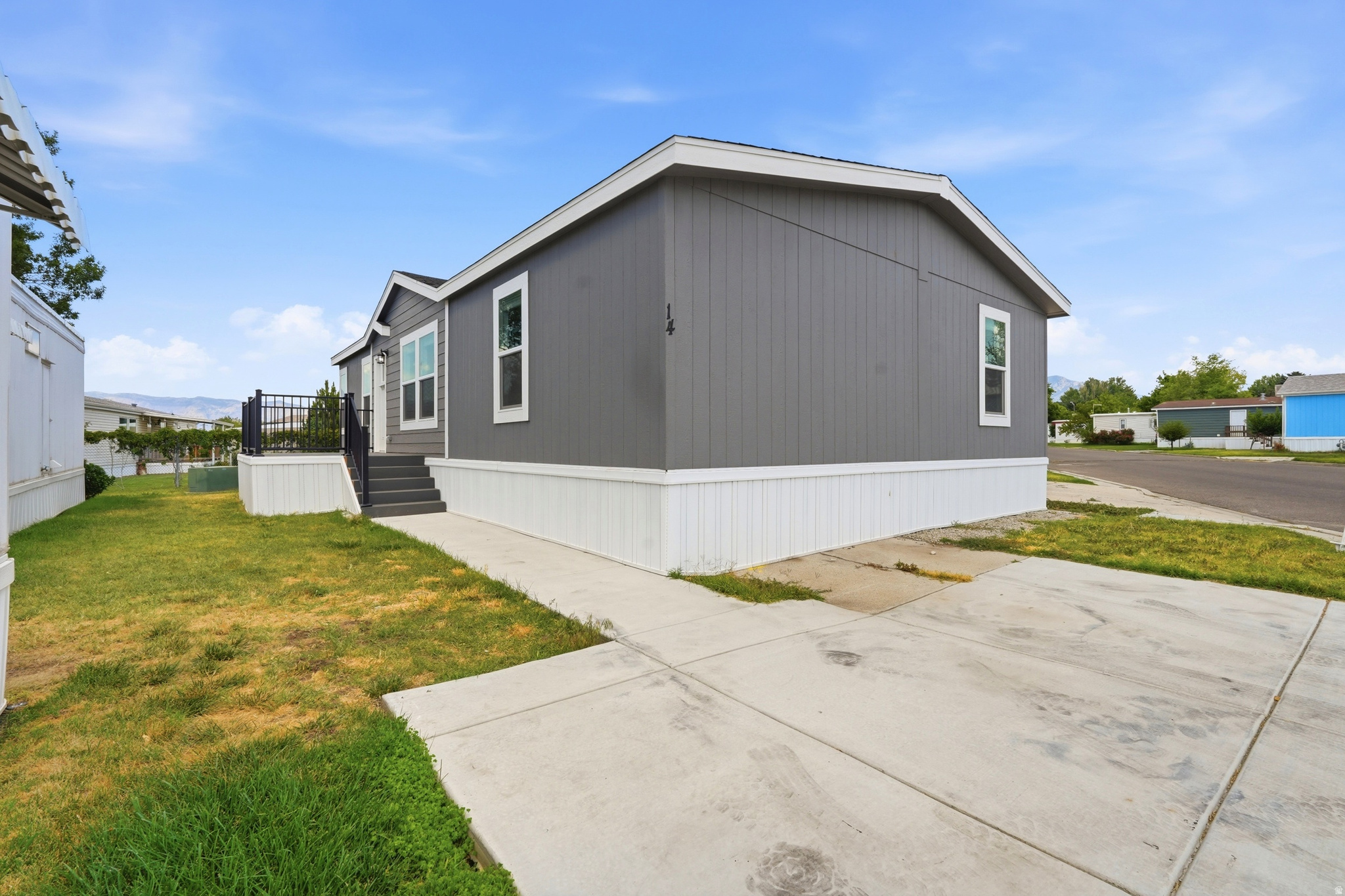 Move-in ready and waiting for its new owner! This beautifully maintained manufactured home features an open-concept floor plan, brand-new appliances, and modern finishes throughout. The spacious primary suite offers a double vanity, walk-in shower, and tons of built-in storage. Enjoy a bright kitchen with a large island, lots of cabinet space, and an inviting living area perfect for entertaining. This home is ready for you to make it your own!