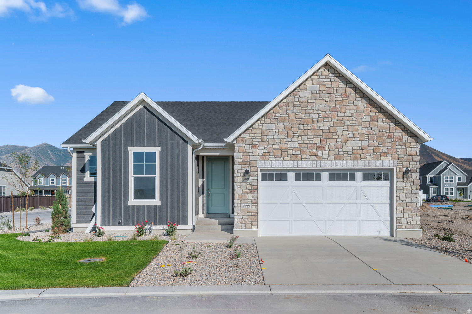 This charming 1350 Garden home is located in a great gated active adult Stansbury Park community with access to walking trails, community pool and pickleball courts. This home blends modern finishes with classic comfort, showcasing a kitchen with quartz countertops, stainless steel gas appliances, and a tile backsplash, complemented by laminate hardwood flooring throughout the main living areas. Enjoy added details like a box window in the owner's bedroom, can lighting, and large Craftsman base and casing. Designed with efficiency in mind, this home also features a tankless water heater, quartz shower surrounds in the owner's bathroom, and satin and brushed nickel hardware throughout. Comes fully landscaped and is maintained by the HOA for hassle free, easy care living!
