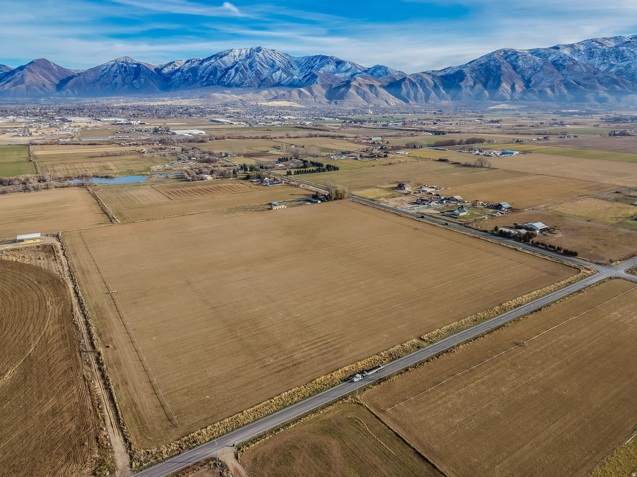Discover an exceptional opportunity on West Mountain in Payson with 33.66 acres of high-production agricultural land, perfectly suited for horse lovers and those seeking wide-open space. This premium parcel includes valuable water shares, full animal rights, and the potential to be subdivided-offering flexibility for a variety of uses or future investment. Currently benefiting from greenbelt tax status, the property features prime frontage along both the south and west sides, enhancing access and visibility. Please note, the home and 5.25 acres are not included in this offering but may be purchased together (home listed MLS #2149857) , creating a total of 38.9 acres. Whether you're expanding an agricultural operation, building your dream equestrian property, or investing in land with incredible potential, this West Mountain property is a rare find. Contact agent for details regarding potential to remove agricultural use. Buyer and buyer agent to verify all listing information offered.