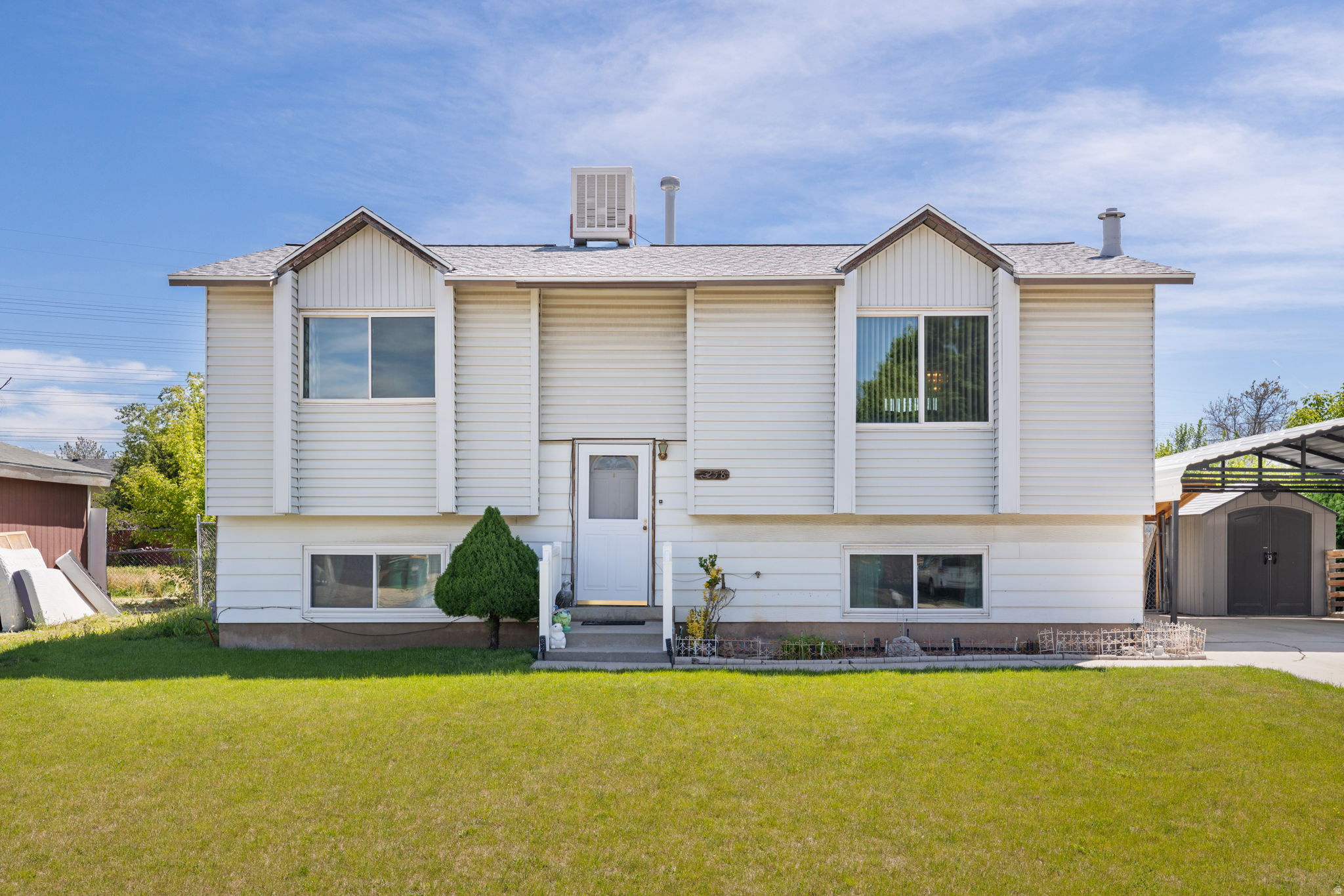 Well cared for and immaculately maintained, this spacious Clearfield split-entry offers an incredible opportunity to build sweat equity in a desirable established neighborhood. With over 2,000 sq ft, 3 bedrooms, 2 bathrooms, a full basement with separate entrance, covered parking, and mountain views, this home has great bones and endless potential for personalization. Pride of ownership shines throughout with consistent upkeep over the years. Conveniently located near schools, parks, shopping, and commuter access. A rare chance to create value and make a home truly your own.