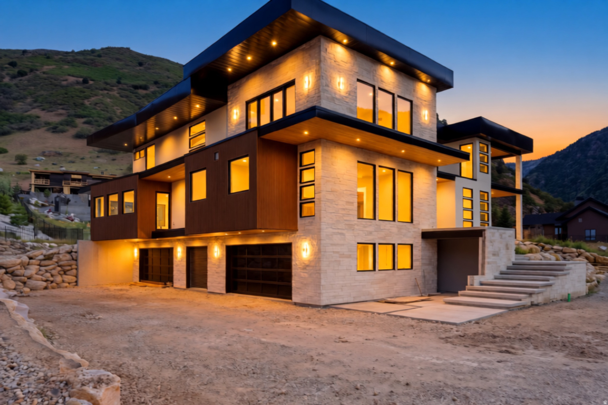 4029 E Canyon Estate | Projected Completion Fall 2026  Welcome to Tavaci, a private gated community at the foothills of Big Cottonwood Canyon, widely regarded as Salt Lake City's premier luxury enclave and home to some of the valley's most distinguished estates and highly acclaimed architecture. Designed for multigenerational living, this custom residence offers 10,608 square feet across four levels connected by a striking glass centerpiece elevator in addition to a 5th story, 4,672 sf Rooftop Terrace.  Positioned to capture unobstructed 360-degree views of both the Salt Lake Valley and Big Cottonwood Canyon, the home features expansive outdoor living and 360 degree mountain and valley views. The Rooftop Terrace is engineered with high structural integrity for jacuzzi and includes a fully automated access hatch for protected entry. The residence is delivered fully landscaped with pool and pool-house.  The primary suite spans nearly 2,000 square feet and includes dual oversized walk-in closets, each with its own private laundry, a wraparound private deck, and a spa-level bathroom featuring a wet room, and curated marble finishes throughout. The suite is designed to maximize both mountain and valley views from every angle.  Upon entry, guests are welcomed by soaring ceilings, a temperature-controlled glass wine room, and the home's signature glass elevator. The main level includes a chef's kitchen, separate butler's kitchen, formal dining area, office, expansive living space, and a concealed library with direct sliding door access to the pool terrace.  The lower level is designed for extended living and wellness, offering additional en-suite accommodations, a full gym, sauna, cold plunge, secondary living space, private office, and full walkout access to the grounds.  The sub-basement level features a full-scale theater room with bar/lounge area and substantial cold storage.