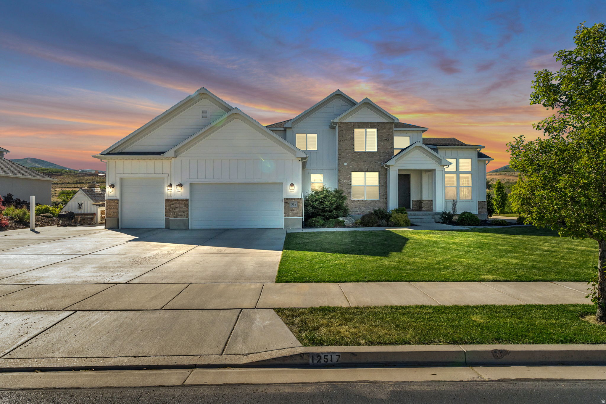 Welcome to this spacious 6-bedroom, 4-bathroom home located at 12517 N Minots Ledge Drive in Highland. Positioned on a generous lot, this property boasts unobstructed views of Lone Peak-a rare feature offered by only a handful of homes in the neighborhood. In addition to the dramatic mountain backdrop, the home offers beautiful views of Utah Lake to the south, providing a stunning natural setting. The interior is clean, bright, and move-in ready, highlighted by fresh new paint throughout that complements the open floor plan. The kitchen is equipped with gas appliances and granite countertops, opening up directly to the main living areas. For maximum energy efficiency, the property comes fully equipped with a solar panel system and Powerwall, significantly cutting utility costs and providing reliable backup power.  Outside, the large yard offers plenty of room to play or entertain and includes a built-in chicken run ready for use. The location strikes a great balance between a quiet neighborhood feel and modern convenience, situated just minutes of travel to the coming Target and Whole Foods. This home offers an excellent combination of views, smart efficiency, and a prime Highland location. Square footage figures are provided as a courtesy estimate only and were obtained from Previous MLS .  Buyer is advised to obtain an independent measurement.