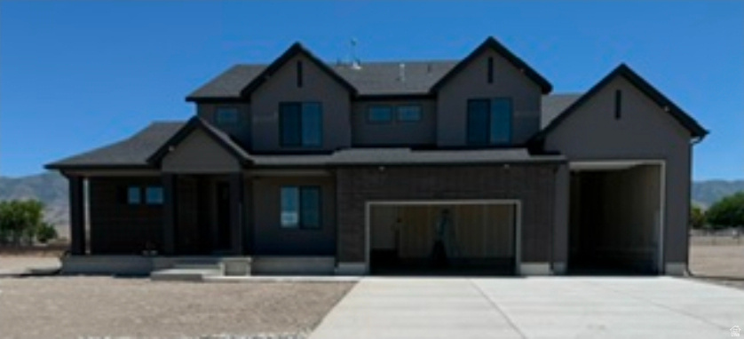 ROCHESTER FLOORPLAN IN THE MAJORS IN EAGLE MOUNTAIN ON .736 OF AN ACRE.  This home will be completed in August 2026.  Get up to $6000 in closing costs with our preferred lender.  The main floor owner's suite has it all: tray ceiling, large walk-in closet with stackable laundry connection, double undercounter sinks, soaker tub and oversized shower. Get cozy in the large family room around the fireplace. The open concept kitchen includes a large island for food prep/counter seating, a large walk-in pantry, kitchen with gas cooktop, double ovens (not pictured in photos) 42" upper cabinets w/ crown molding, 30" Single sink, upgraded cabinet with dovetail, soft-close features. Laminate floor throughout the kitchen, dining, & family room. Quartz countertop in kitchen and bathrooms, Powder room located next to the garage entry and mud room bench. Stair railing with newel posts. Office with double doors.  Upstairs has a loft, 3 large bedrooms, full bathroom, and full laundry room. Home includes unfinished basement with 9' foundation walls, room for a large family room, 2 additional bedrooms, a bathroom, and under porch storage. 2 95% efficient furnaces, 50-gallon water heater, & plumbed for a soft-water system. 3-car RV garage with 12' x 10' door and extra space on the side of the garage to add an RV pad. Sitting on a .736-acre, this home has it all!  Ask me about our generous home warranties, active radon Mitigation System, and Smart Home Package, which is included in this home. The actual home may differ in color, material, and/or options. Pictures are of a finished home of the same floorplan, and the available home may contain different options, upgrades, and exterior color and/or elevation style. Square footage figures are provided as a courtesy estimate only and were obtained from building plans. No representation or warranties are made regarding school districts and assignments; please conduct your own investigation regarding current/future school boundaries.   *****Please note, the kitchen is different from photos.  The kitchen is our Deluxe Luxury Kitchen and will have double ovens and a separate cook top and many other beautiful features.