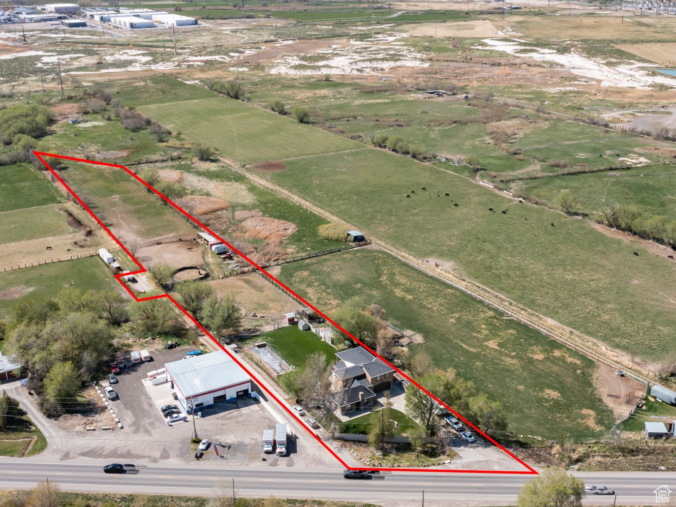 The value is in the land. Sale includes both parcels 26-055-0075 & 26-055-0076 (48 hours' notice required for showings). | Opportunity: Prime Land-Banking/Development property in Springville's Dry Creek Master Plan (see attached PDF), with future mixed-use potential and interim rental use. | Infrastructure proximity: Sewer is approx. 1 mile north on SR-51 near 1695 South (buyer to verify). | Assemblage upside: Over 30 contiguous acres to the west may be available for potential sale or joint-venture assemblage. | Water: Property currently operates on a reliable well system; an irrigation water right may be available for separate purchase. | Disclosure: Square footage/acreage per county records; buyer advised to obtain independent measurement and complete due diligence.