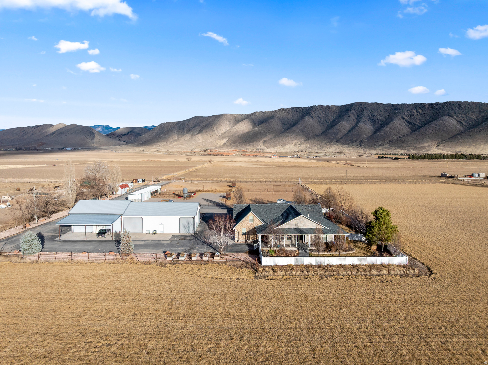 Beautifully updated 5 bed, 3 bath home featuring an open-concept single level living with a loft about garage - perfect for a bonus room, office, or guest space. This house is thoughtfully designed with lots of storage and modern updates throughout. Nestled on 9.5 secluded acres, this premier horse property offers animal wash bays, corrals and plenty of room to roam. The property also offers a huge shop (approx. 100X40)  with a bathroom, room to park many vehicles and toys with lots of storage.