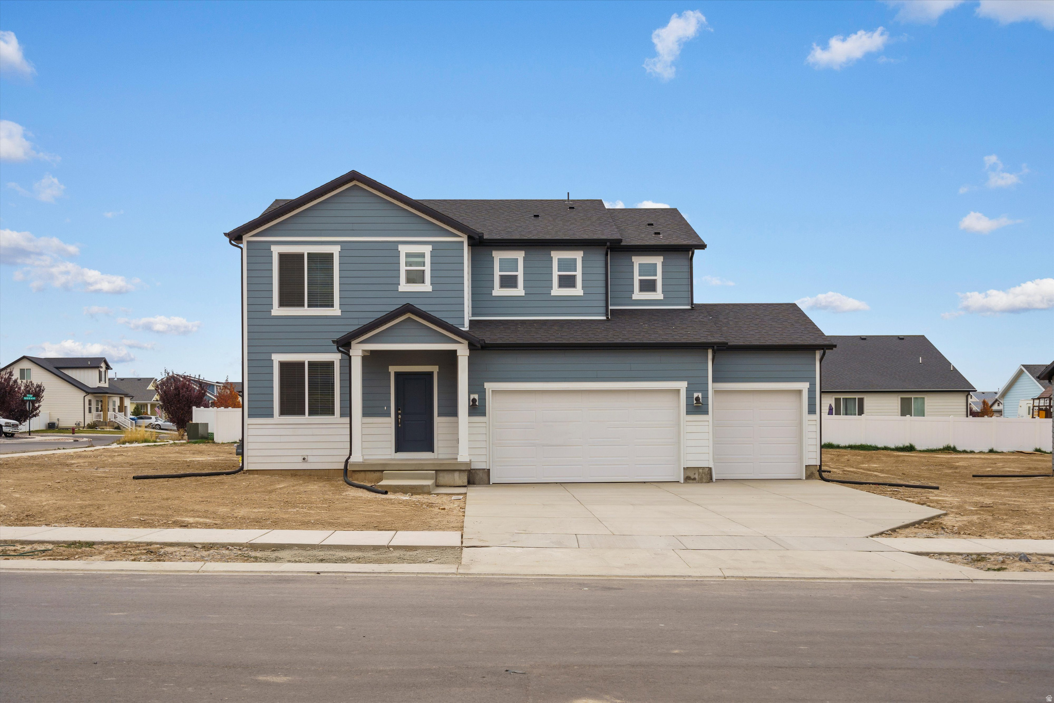 This stunning home features a welcoming living room and a spacious kitchen island perfect for hosting guests. Upstairs, the loft offers the ideal space to design your dream media room. Unfinished basement included. Move in ready with a washer, dryer, fridge and blinds throughout! Total home approx. sq. ft. 3,065.