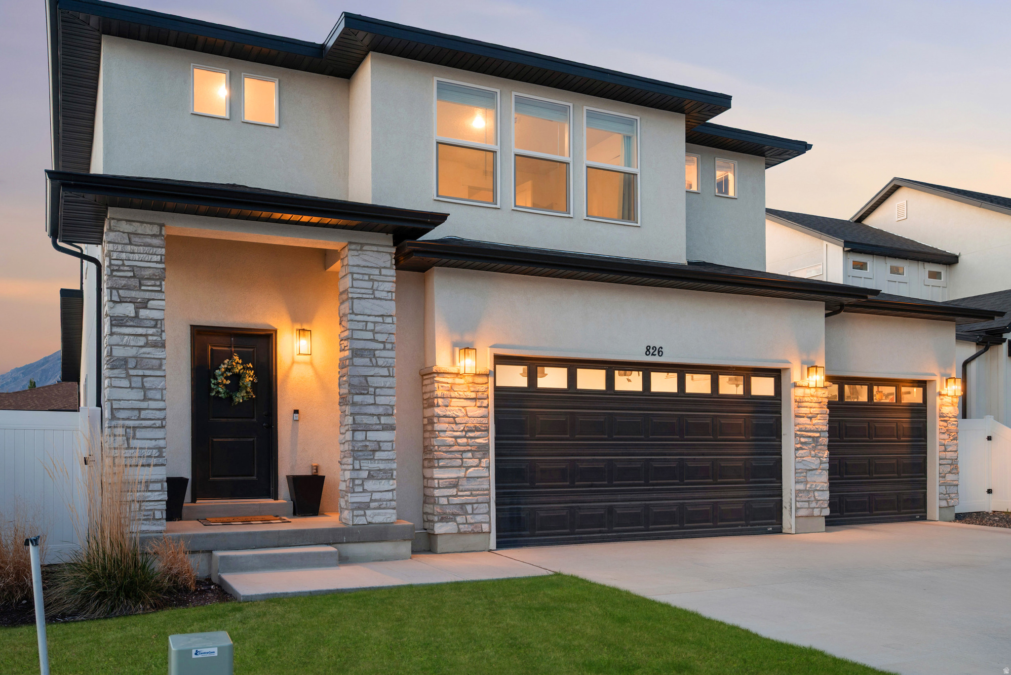 COMPELLING NEW PRICE on this dream home in beautiful Mapleton, Utah! This modern, almost new home offers FOUR BEDROOMS + A LOFT,  a 3-CAR GARAGE perfect for your toys and tools, and a MAIN-FLOOR PRIMARY BEDROOM. We can almost smell the grill heating up for summer cookouts in the FULLY FENCED BACKYARD with an oversized concrete pad. The smartly designed floor plan offers an expansive entryway, MUDROOM, and an expanded open-concept GREAT ROOM. When building this home a few years ago, the sellers thoughtfully selected about $90,000 WORTH OF UPGRADES, details that make living and moving through a home feel easy. Structural upgrades include 9-FOOT CEILINGS, an expanded (pop-out) gathering area, and the third car garage with premium EPOXY GARAGE FLOORING. Saturday morning pancakes are coming right up in the UPGRADED KITCHEN, featuring higher-end cabinets and sink, stainless appliances, canned lights, and a nice big pantry. The SPACIOUS PRIMARY BATHROOM, offering dual sinks and a spacious walk-in closet will be your perfect place to relax. The UPGRADED WINDOWS and ADDED INSULATION (including in the garage) support energy efficiency. The neighborhood is perfect, with a huge park and bike pump track being built, as well as easy access to ATV trails and a paved walking trail. Mapleton is an idyllic mountainside community with stunning, almost unreal mountain views. It has a small-town, rural feel, but you will still be close to modern conveniences like schools, medical centers, shopping, and dining. Mapleton is ideal for those who love hiking, biking, and horseback riding, thanks to its plentiful parks and trails. The nearby Spanish Fork Canyon offers fishing, camping and hot springs. Lets get you into this beautiful, modern, and well-appointed home ASAP.  Contact the listing agents or your favorite local Realtor for a private showing or we will see you at the open house!  *All information including square footage figures are provided as a courtesy estimate only. Buyer advised to independently verify all information.
